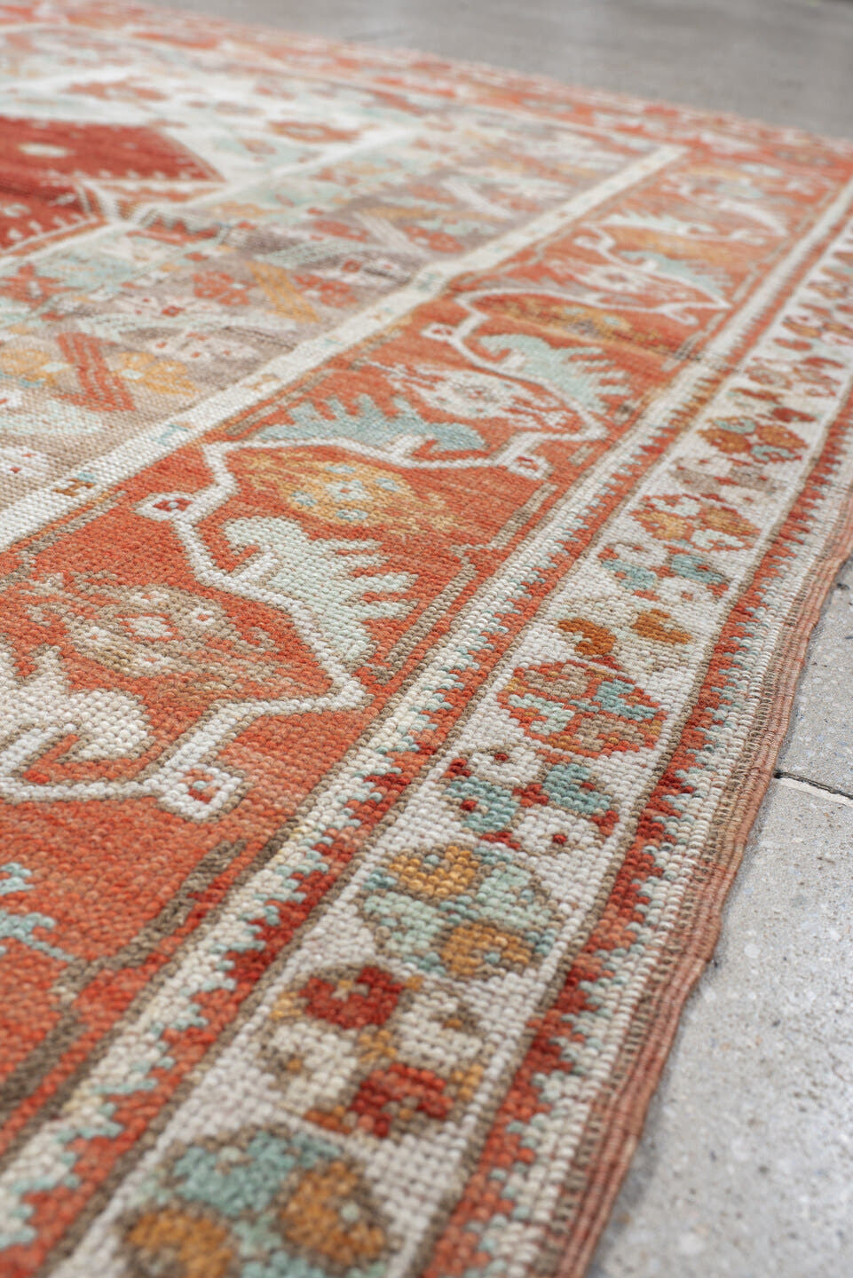 4' x 5' one-of-a-kind handmade vintage Anatolian small size rug. Color palette: terra cotta, ivory, pale aqua, sand, rust