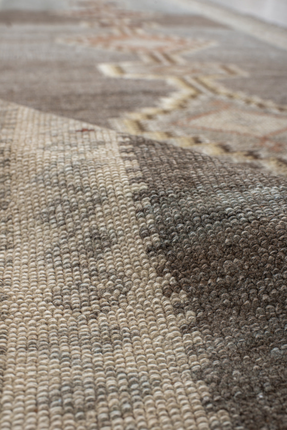 2' x 11' one-of-a-kind handmade vintage Gabbe runner rug. Color palette: taupe, ivory, slate, camel, rose, brown, beige