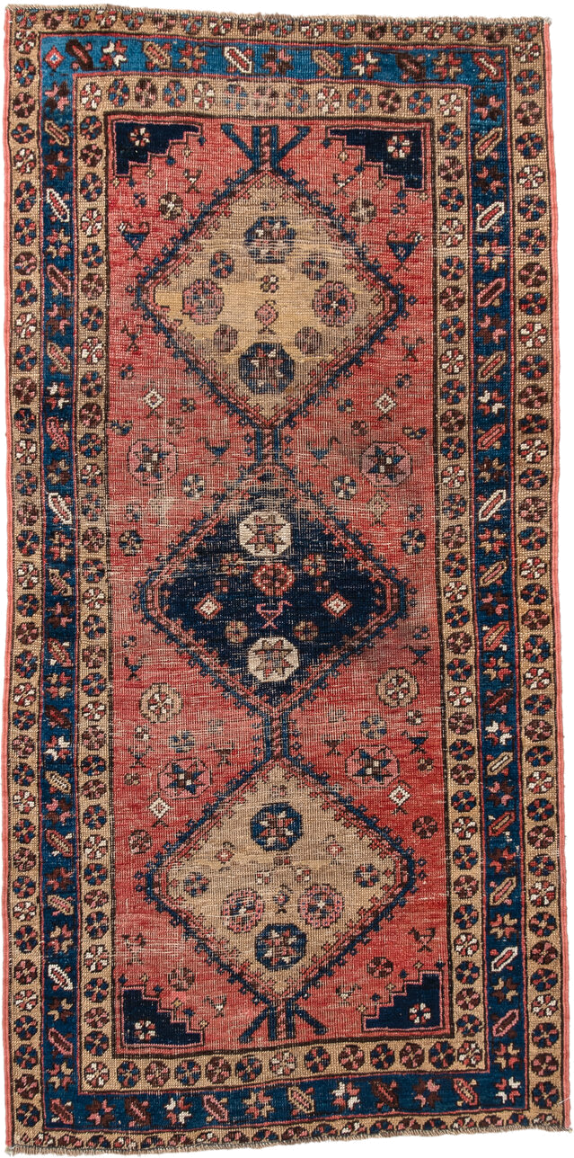 3' x 6' one-of-a-kind handmade antique  runner rug. Color palette: rose, indigo, ivory, rust, navy, camel, crimson, pink