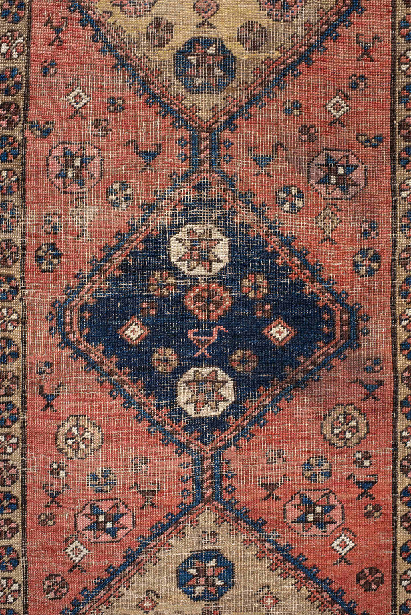 3' x 6' one-of-a-kind handmade antique  runner rug. Color palette: rose, indigo, ivory, rust, navy, camel, crimson, pink