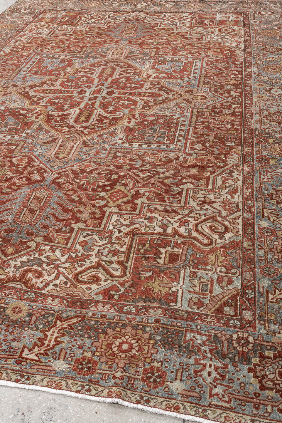 8' x 11' one-of-a-kind handmade vintage Heriz large size rug. Color palette: terracotta, sky blue, ivory, rust, taupe, camel
