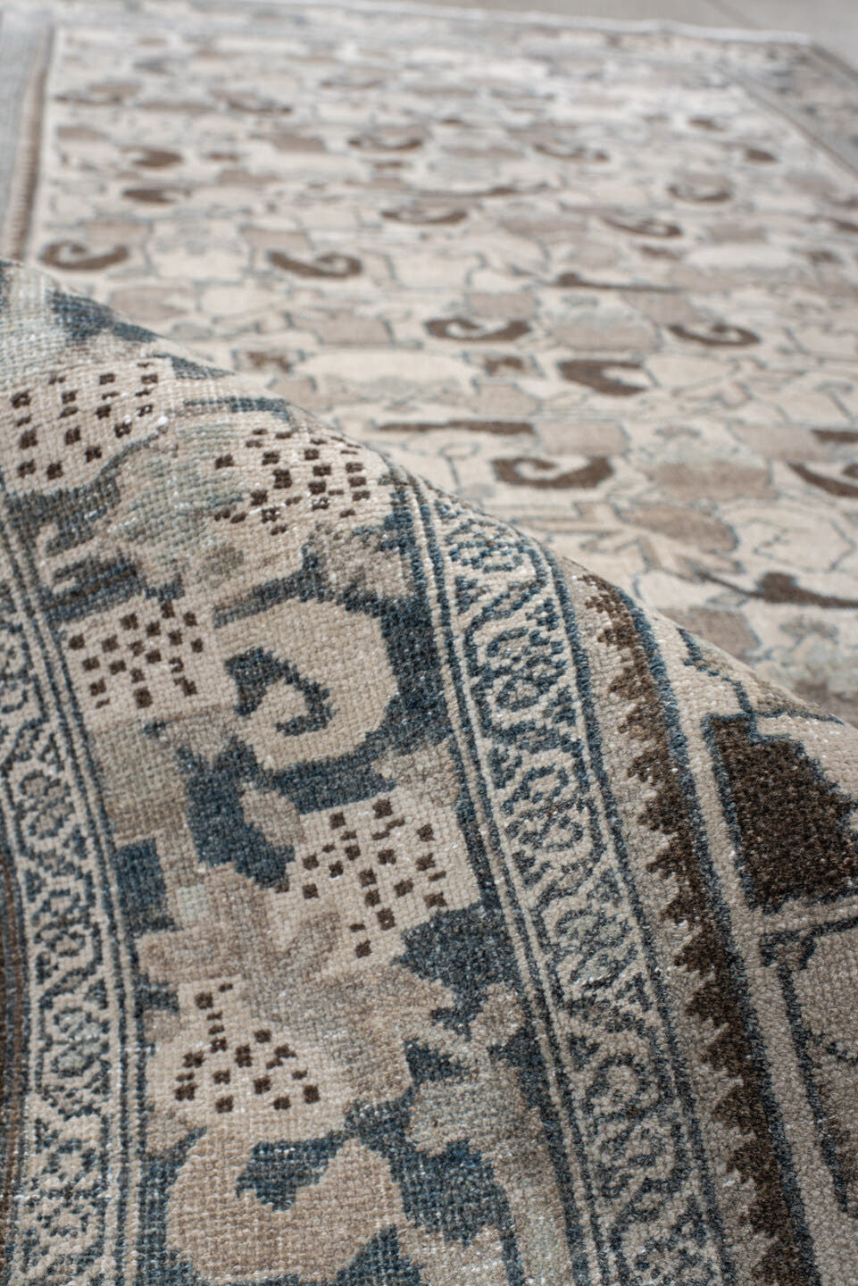 4' x 8' one-of-a-kind handmade vintage Bidjar rug. Color palette: ivory, pale blue, taupe, brown, gray, beige, light blue