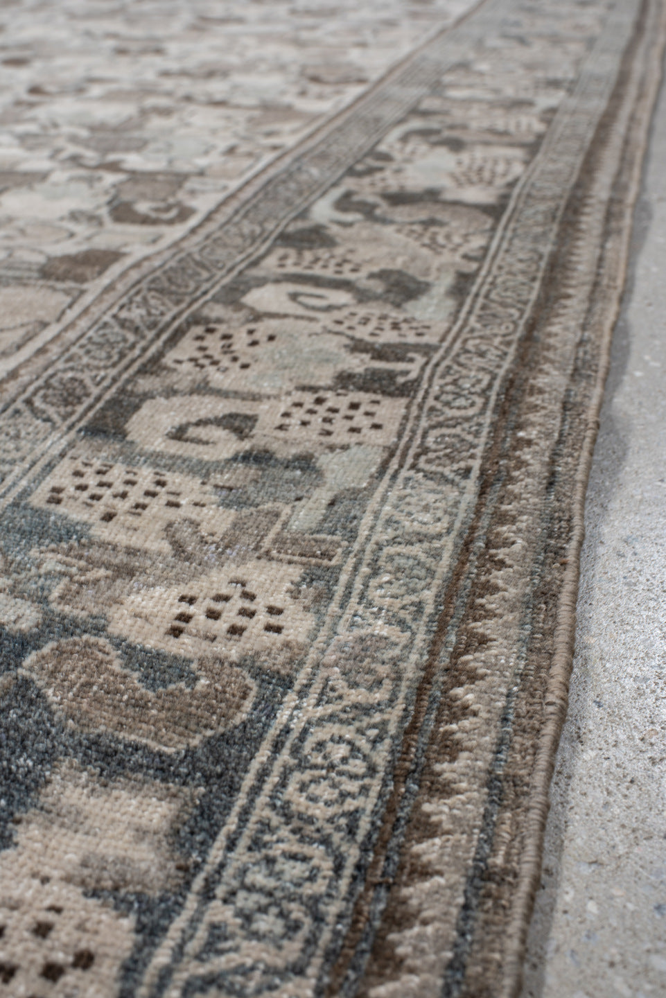 4' x 8' one-of-a-kind handmade vintage Bidjar rug. Color palette: ivory, pale blue, taupe, brown, gray, beige, light blue