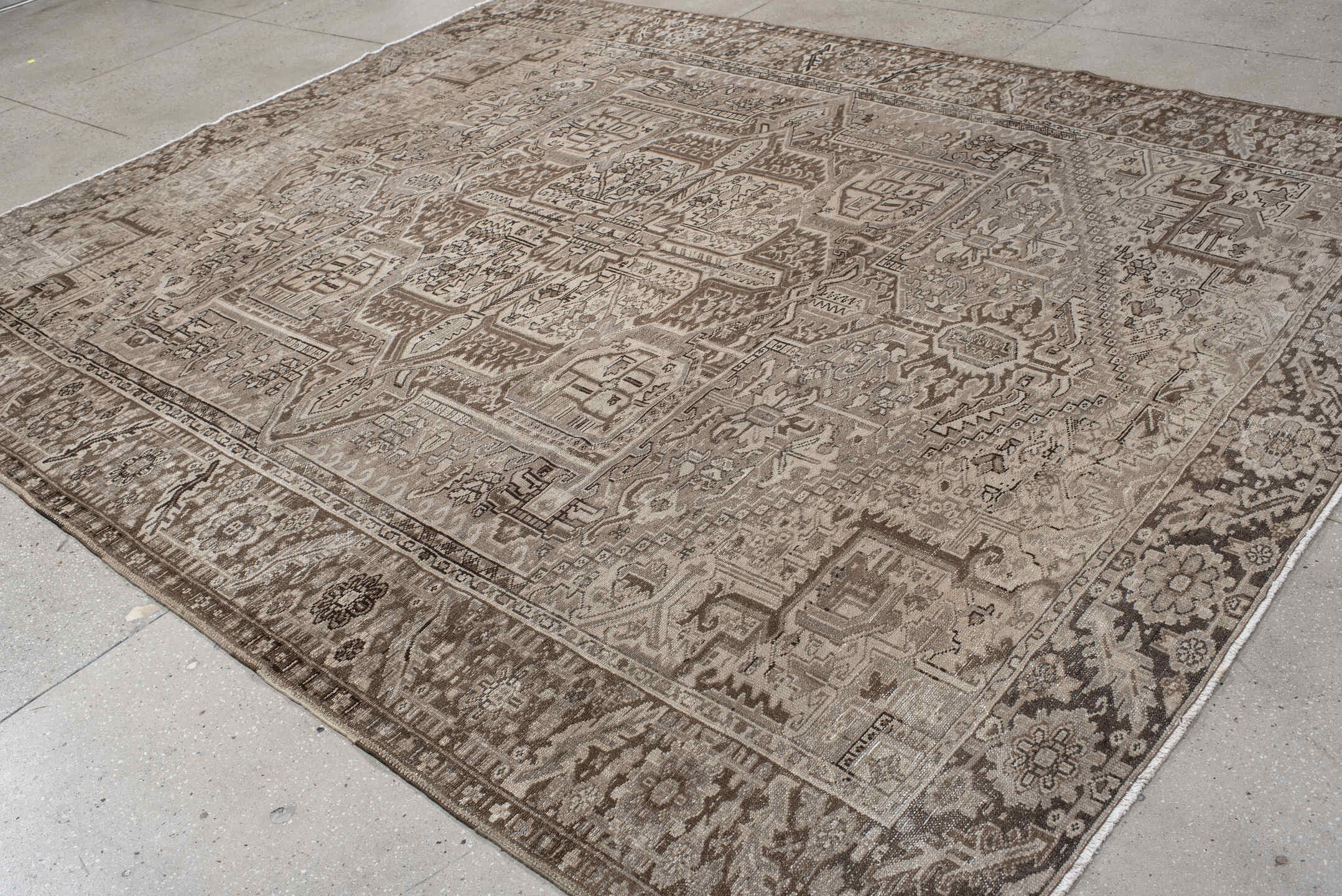 9' x 11' one-of-a-kind handmade vintage Karaje large size rug. Color palette: taupe, brown, ivory, camel, charcoal, beige