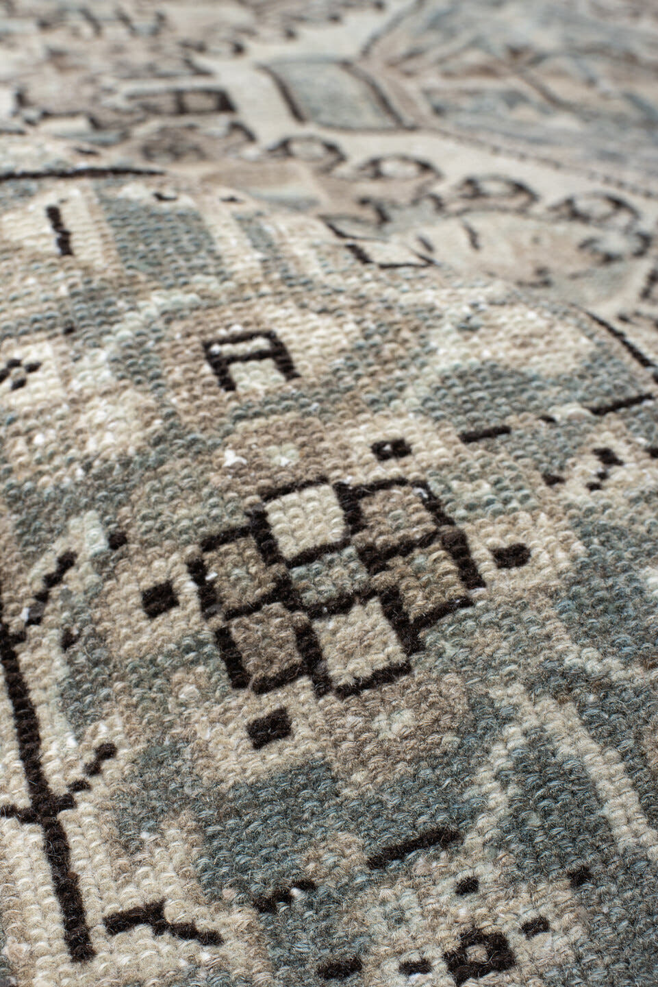 5' x 6' one-of-a-kind handmade vintage Karaje rug. Color palette: ivory, pale blue, taupe, charcoal, beige, slate