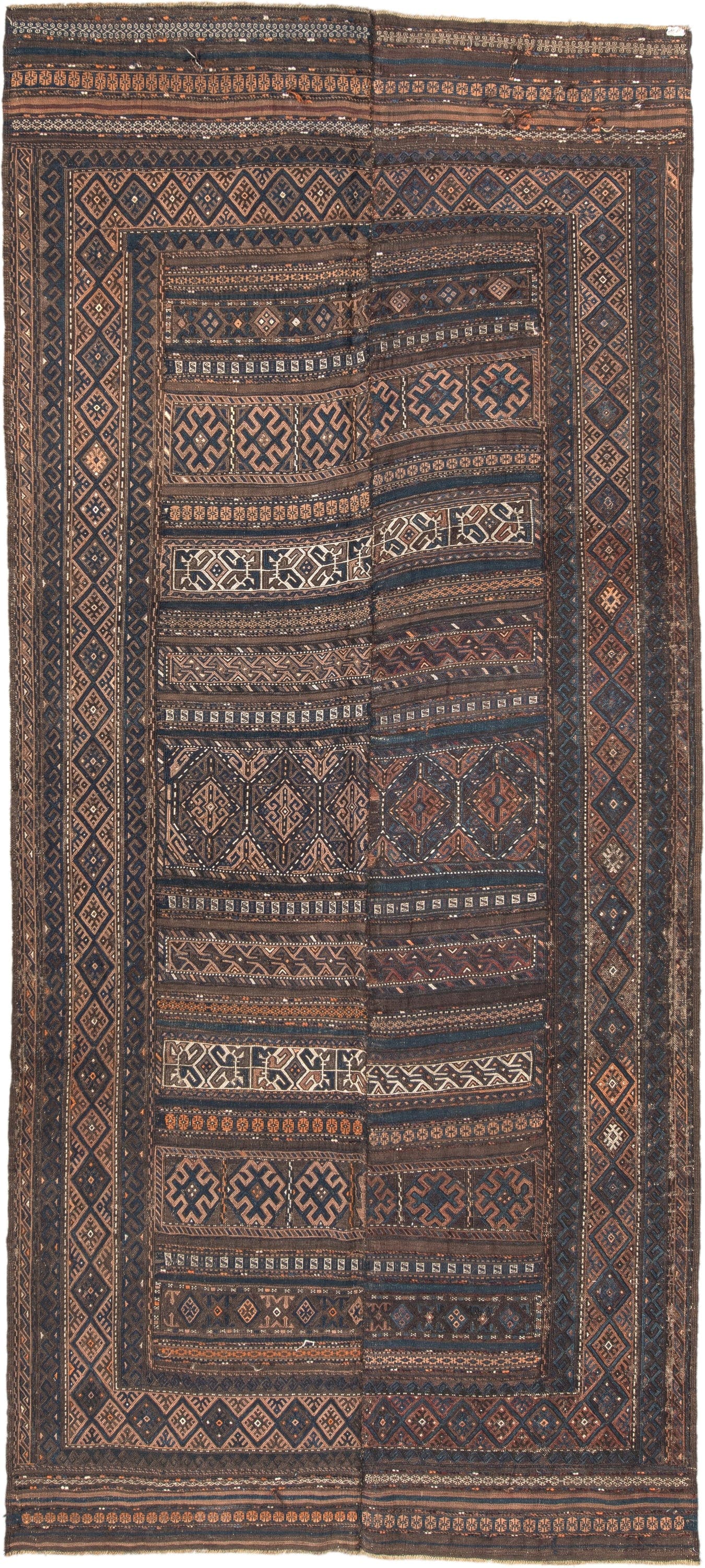 5' x 11' one-of-a-kind handmade vintage Kilim rug. Color palette: brown, indigo, rust, camel, ivory, charcoal, purple