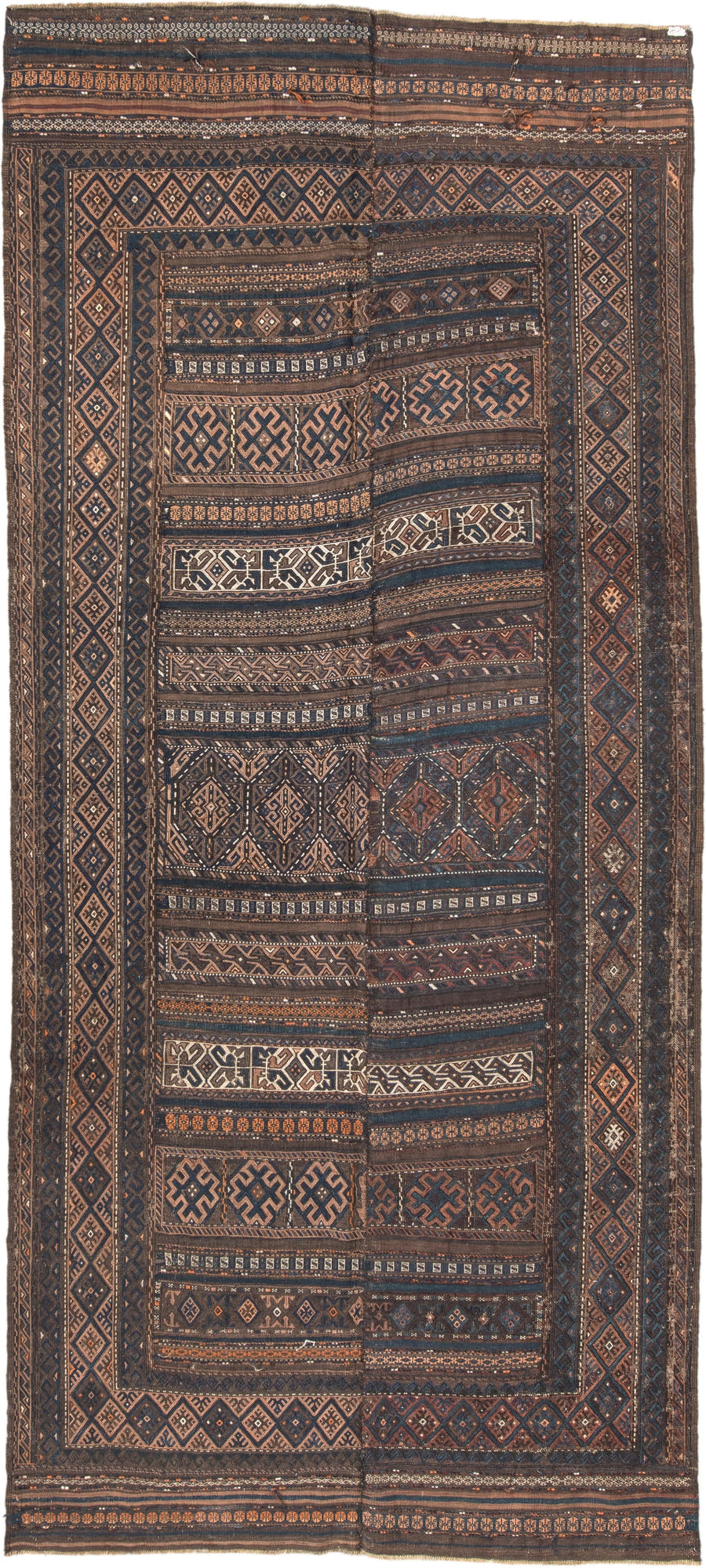 5' x 11' one-of-a-kind handmade vintage Kilim rug. Color palette: brown, indigo, rust, camel, ivory, charcoal, purple