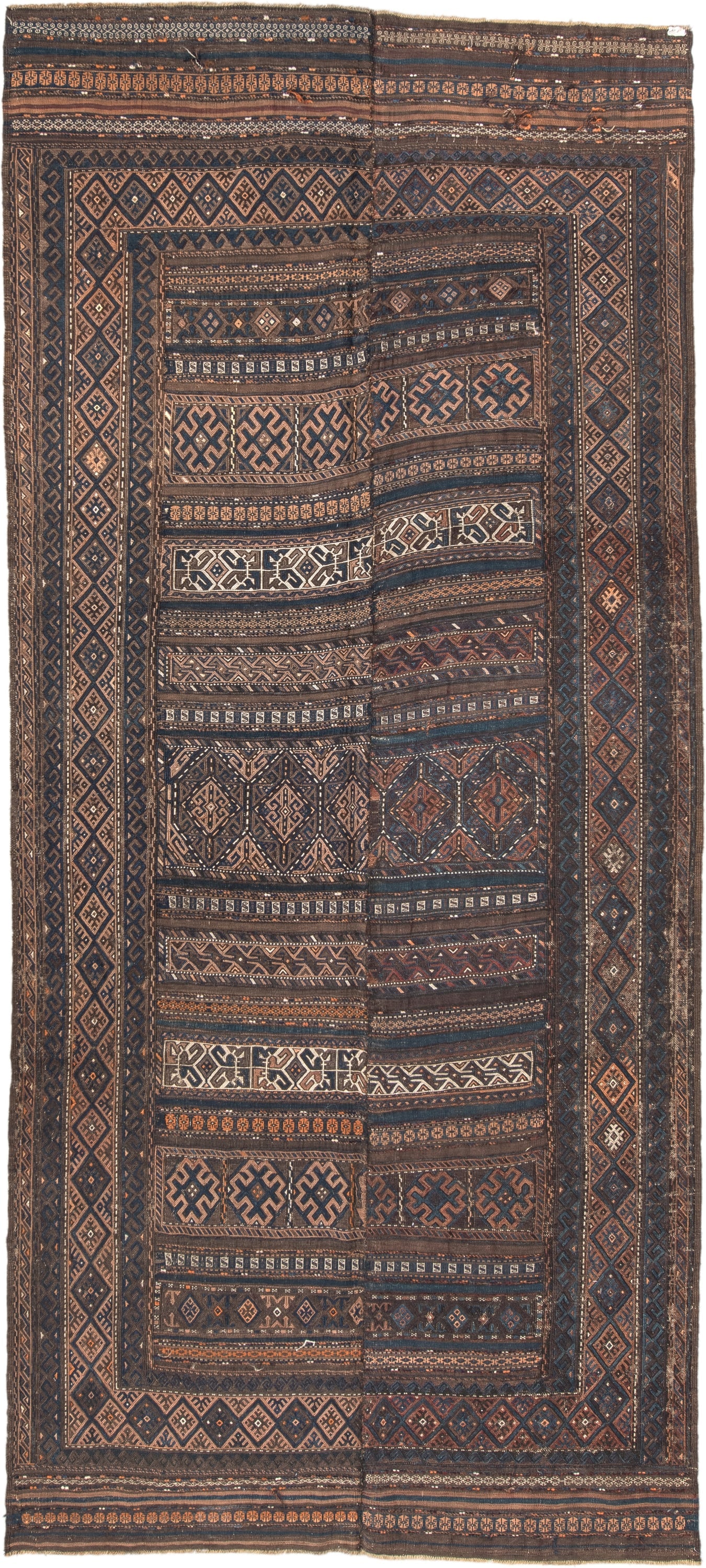 5' x 11' one-of-a-kind handmade vintage Kilim rug. Color palette: brown, indigo, rust, camel, ivory, charcoal, purple