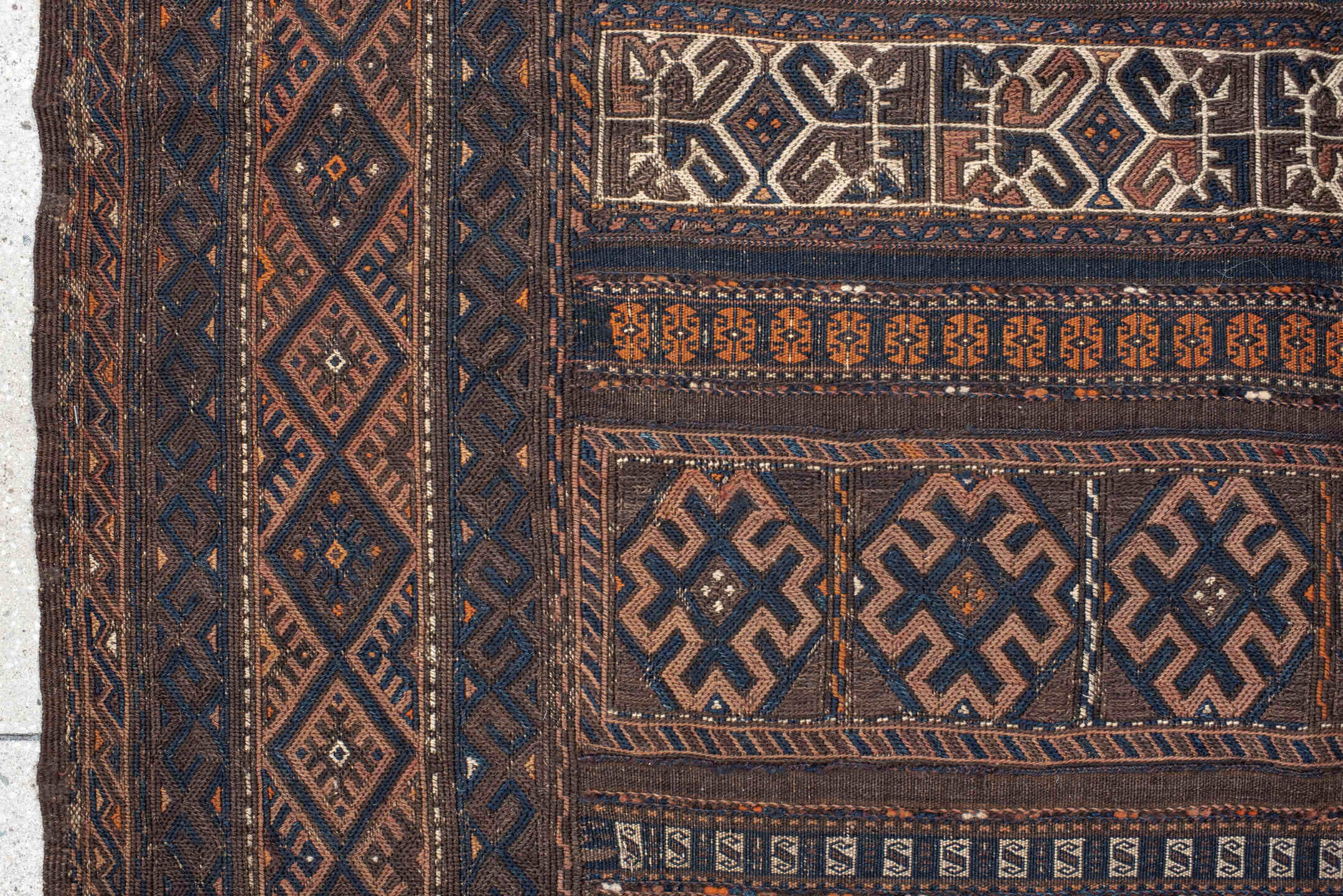 5' x 11' one-of-a-kind handmade vintage Kilim rug. Color palette: brown, indigo, rust, camel, ivory, charcoal, purple