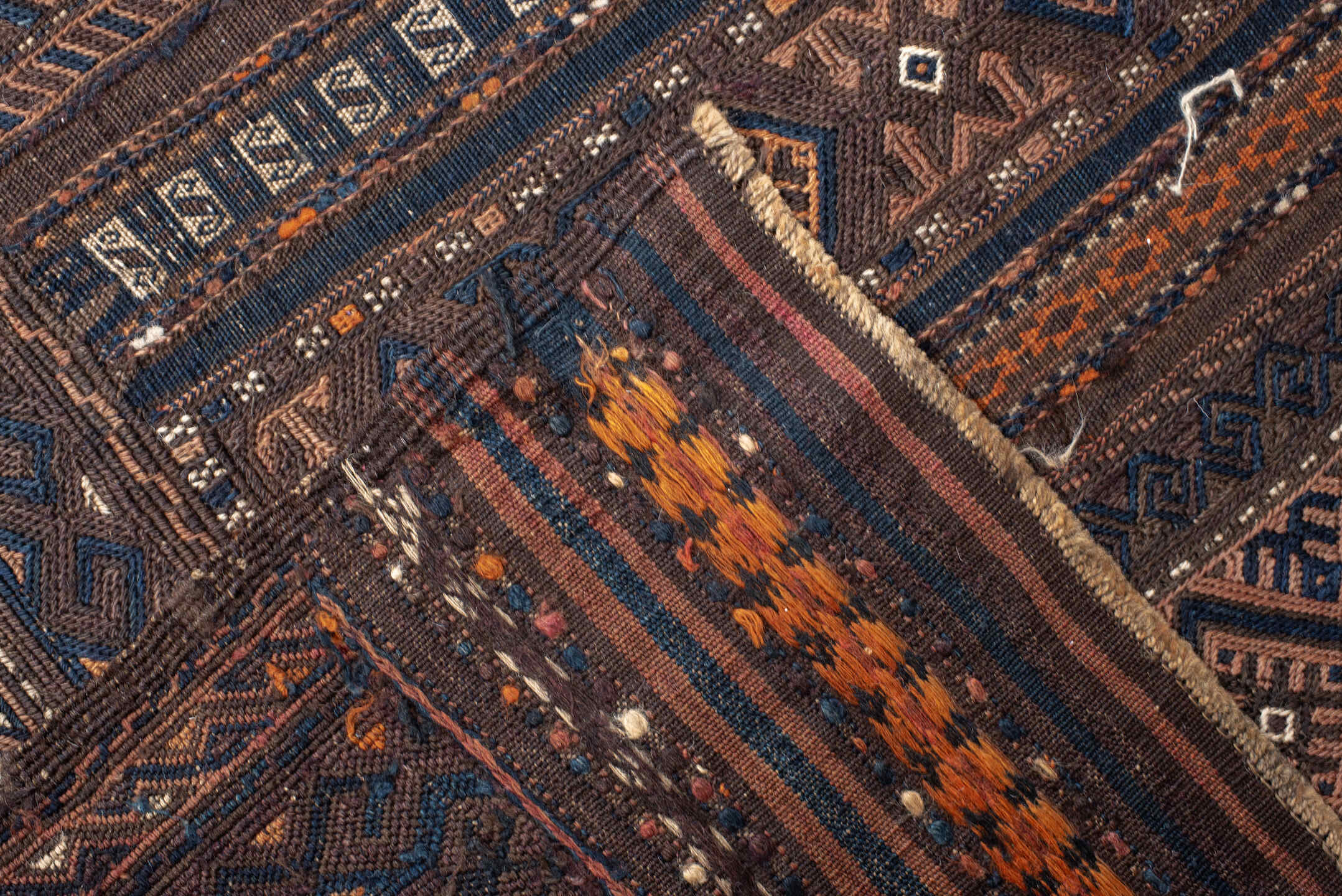 5' x 11' one-of-a-kind handmade vintage Kilim rug. Color palette: brown, indigo, rust, camel, ivory, charcoal, purple