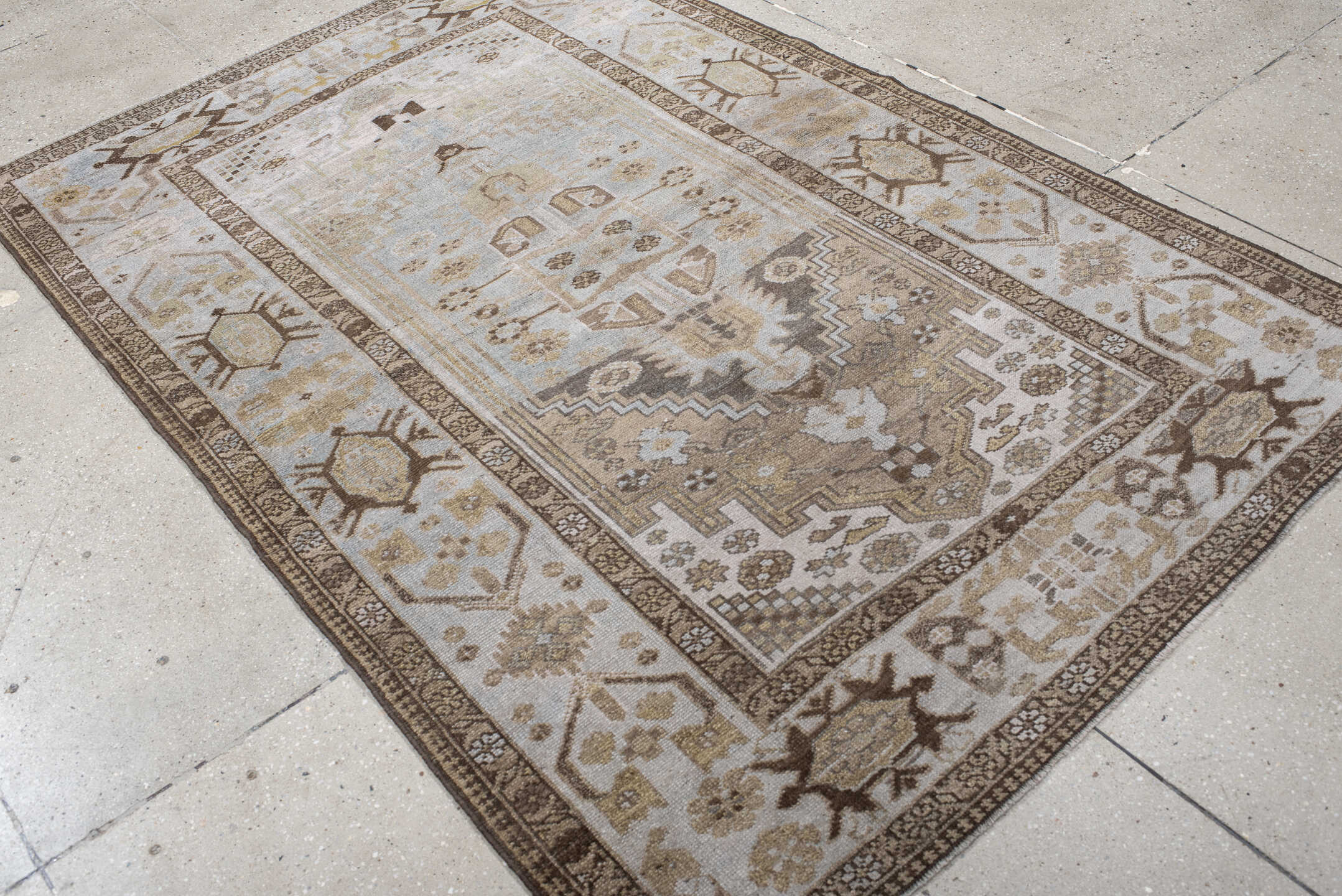 4' x 6' one-of-a-kind handmade vintage Sarab small size rug. Color palette: ivory, light blue, taupe, brown, camel, sage