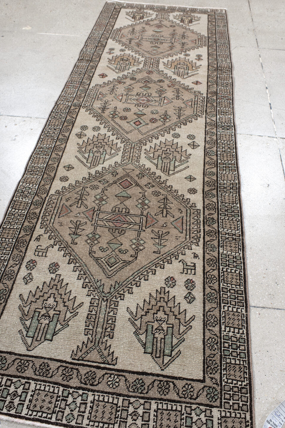 3' x 9' one-of-a-kind handmade vintage Sarab runner rug. Color palette: ivory, taupe, charcoal, sage, rust, camel, beige