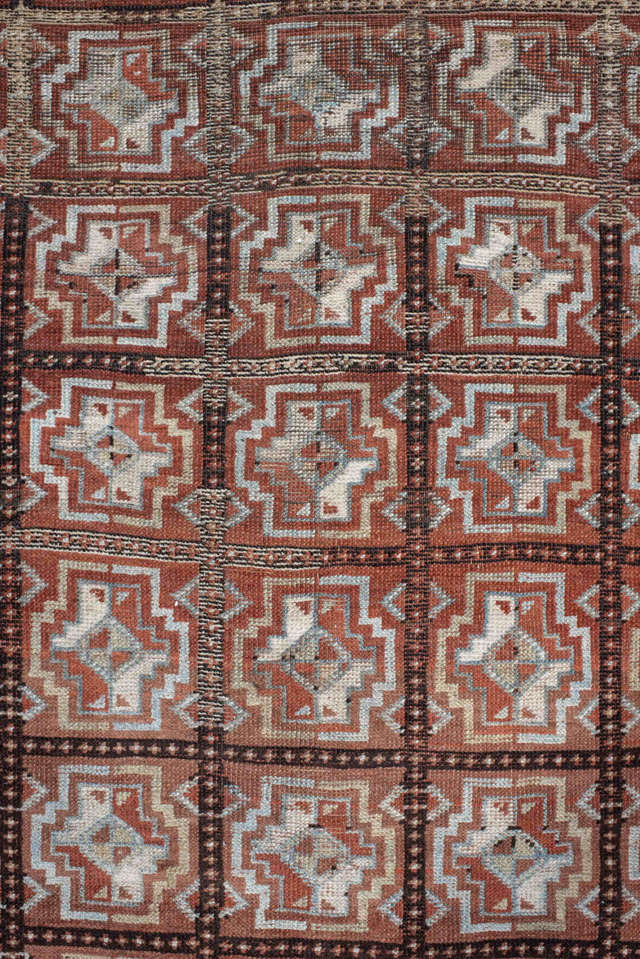 3' x 7' one-of-a-kind handmade vintage Kurd rug. Color palette: rust, ivory, light blue, charcoal, terracotta, camel, brown