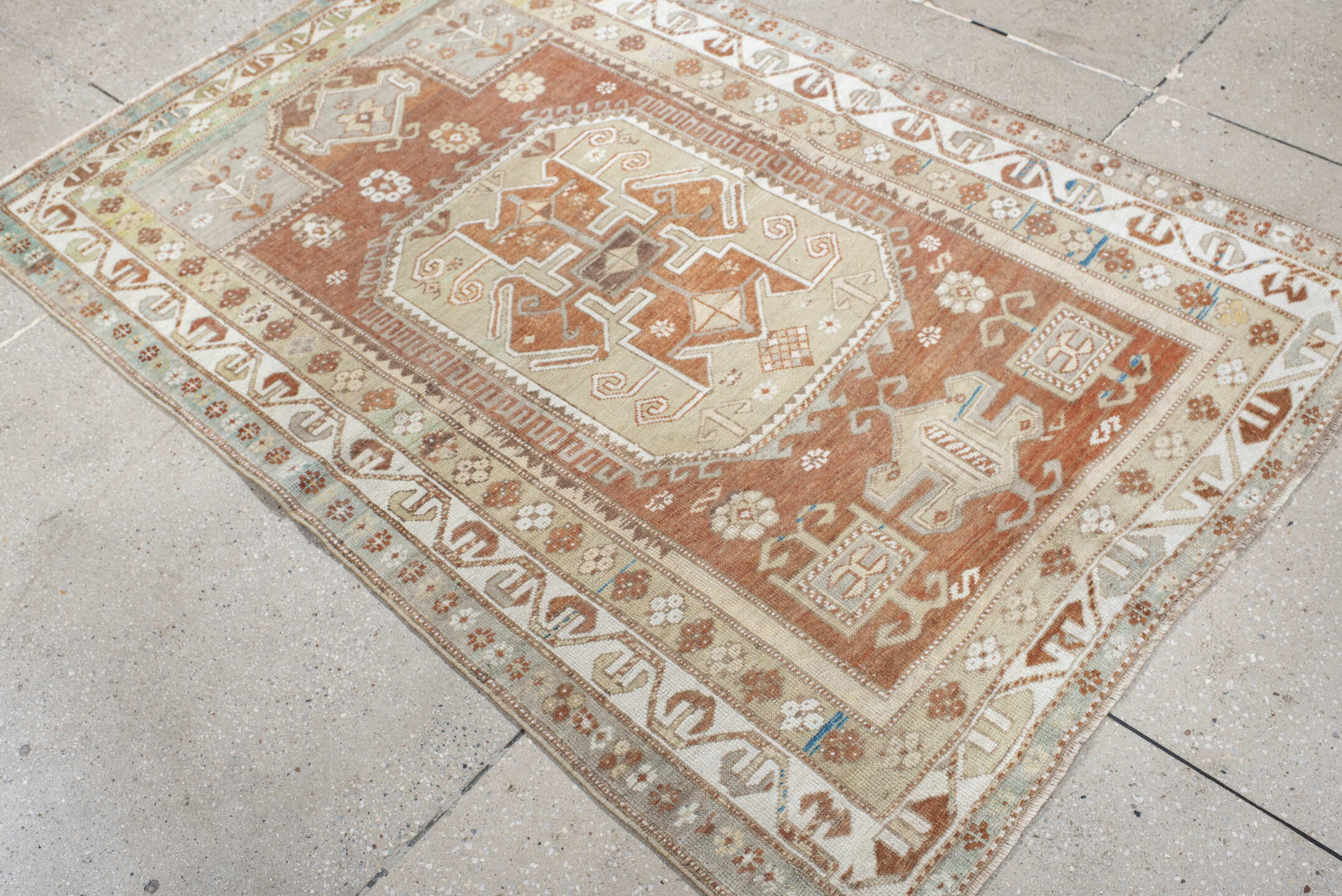 3' x 5' one-of-a-kind handmade vintage Anatolian small size rug. Color palette: rust, ivory, pale aqua, sage, taupe, camel