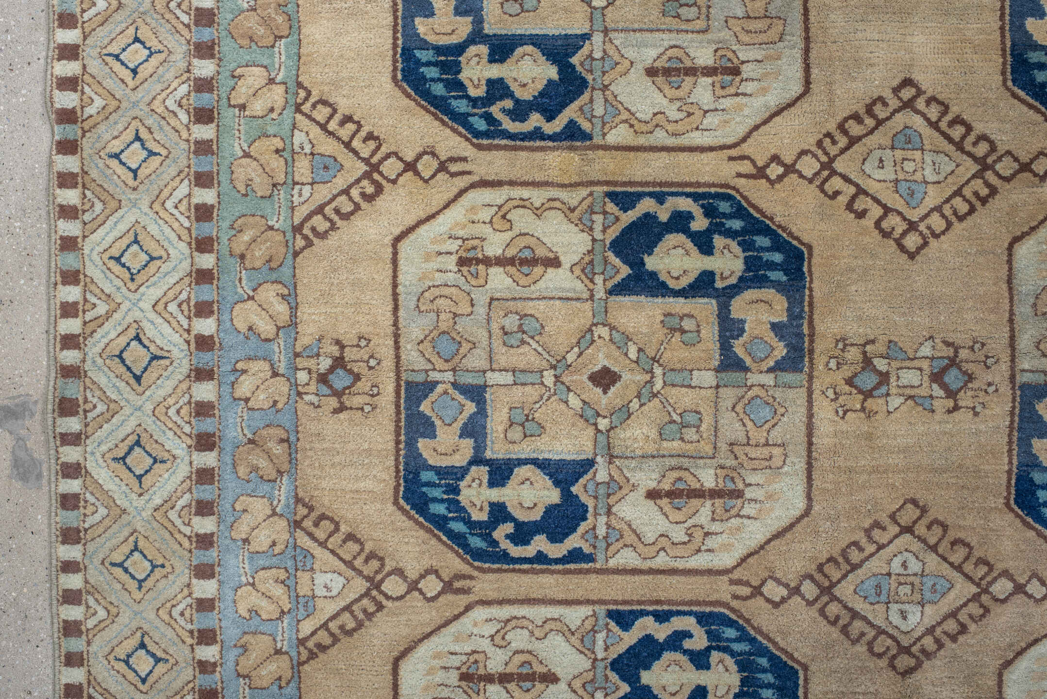 7' x 10' one-of-a-kind handmade vintage Hooked large size rug. Color palette: ivory, sky_blue, navy, tan, camel, taupe