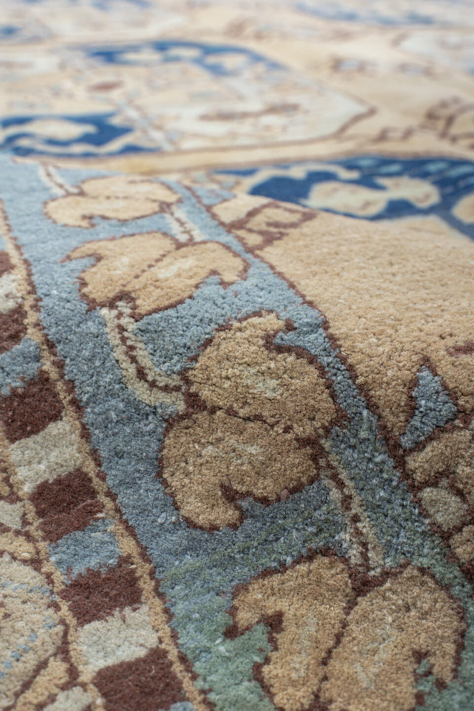 7' x 10' one-of-a-kind handmade vintage Hooked large size rug. Color palette: ivory, sky_blue, navy, tan, camel, taupe