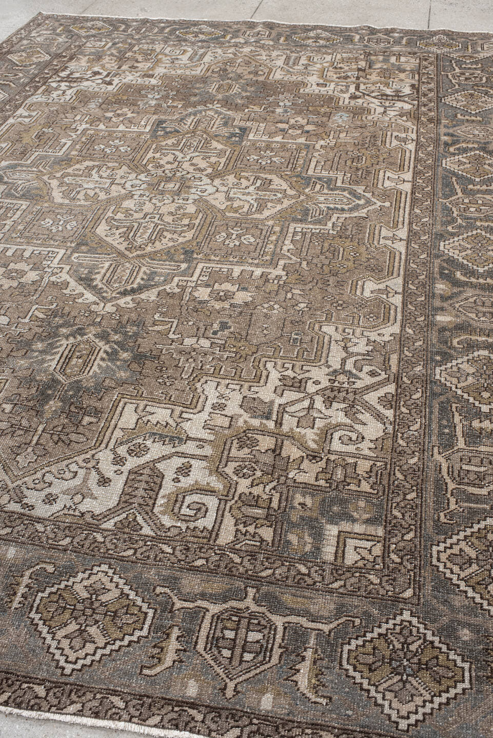 8' x 11' one-of-a-kind handmade vintage Heriz large size rug. Color palette: taupe, ivory, slate, brown, gold, charcoal