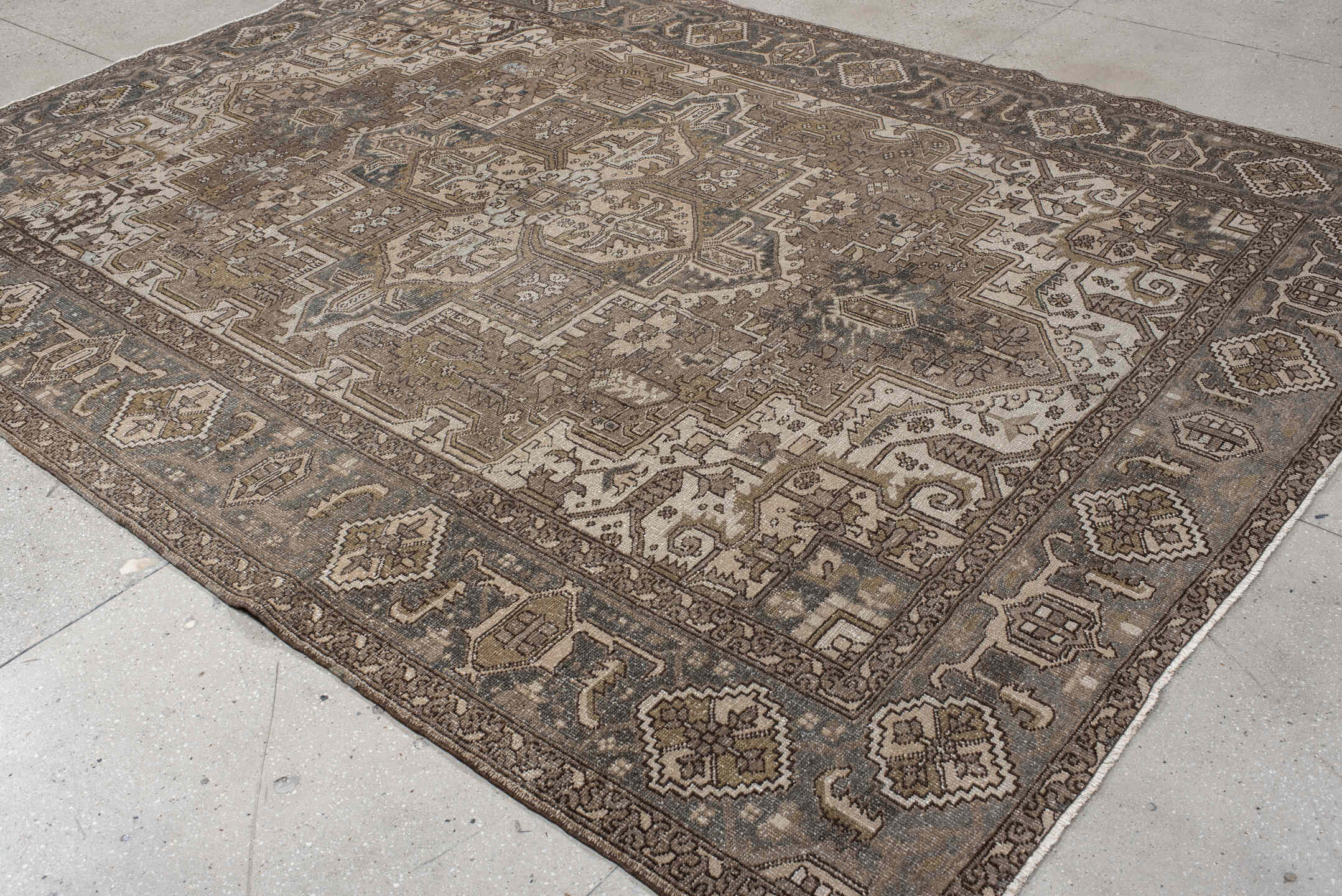 8' x 11' one-of-a-kind handmade vintage Heriz large size rug. Color palette: taupe, ivory, slate, brown, gold, charcoal