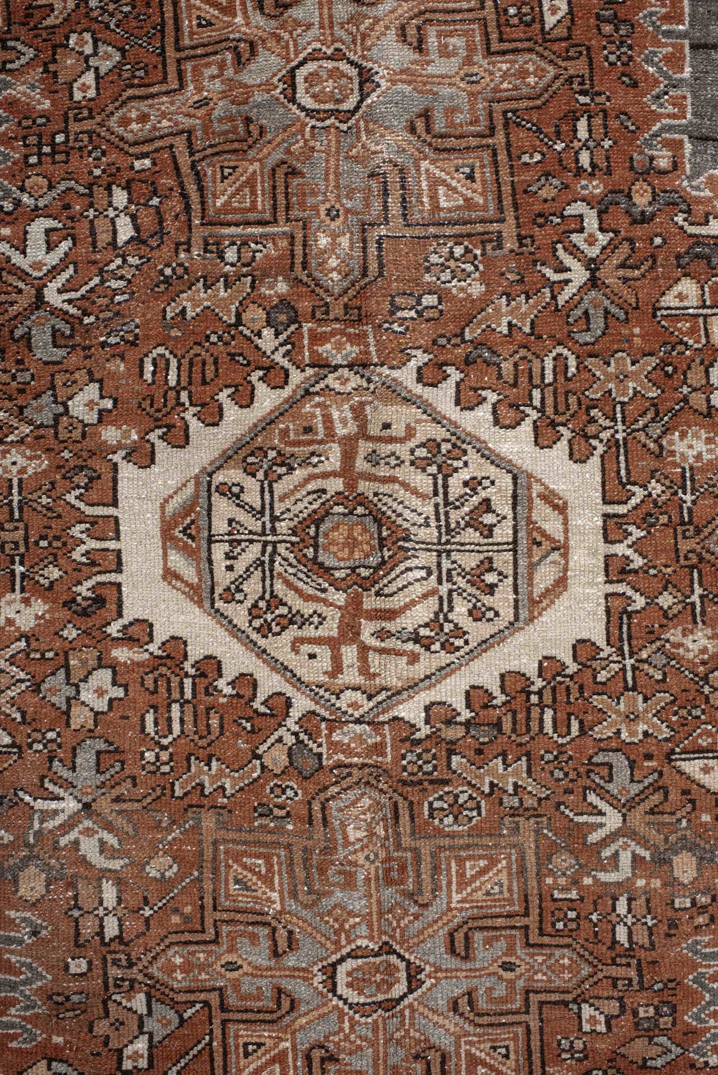 7' x 10' one-of-a-kind handmade vintage Karaje large size rug. Color palette: rust, brown, ivory, slate, taupe, camel