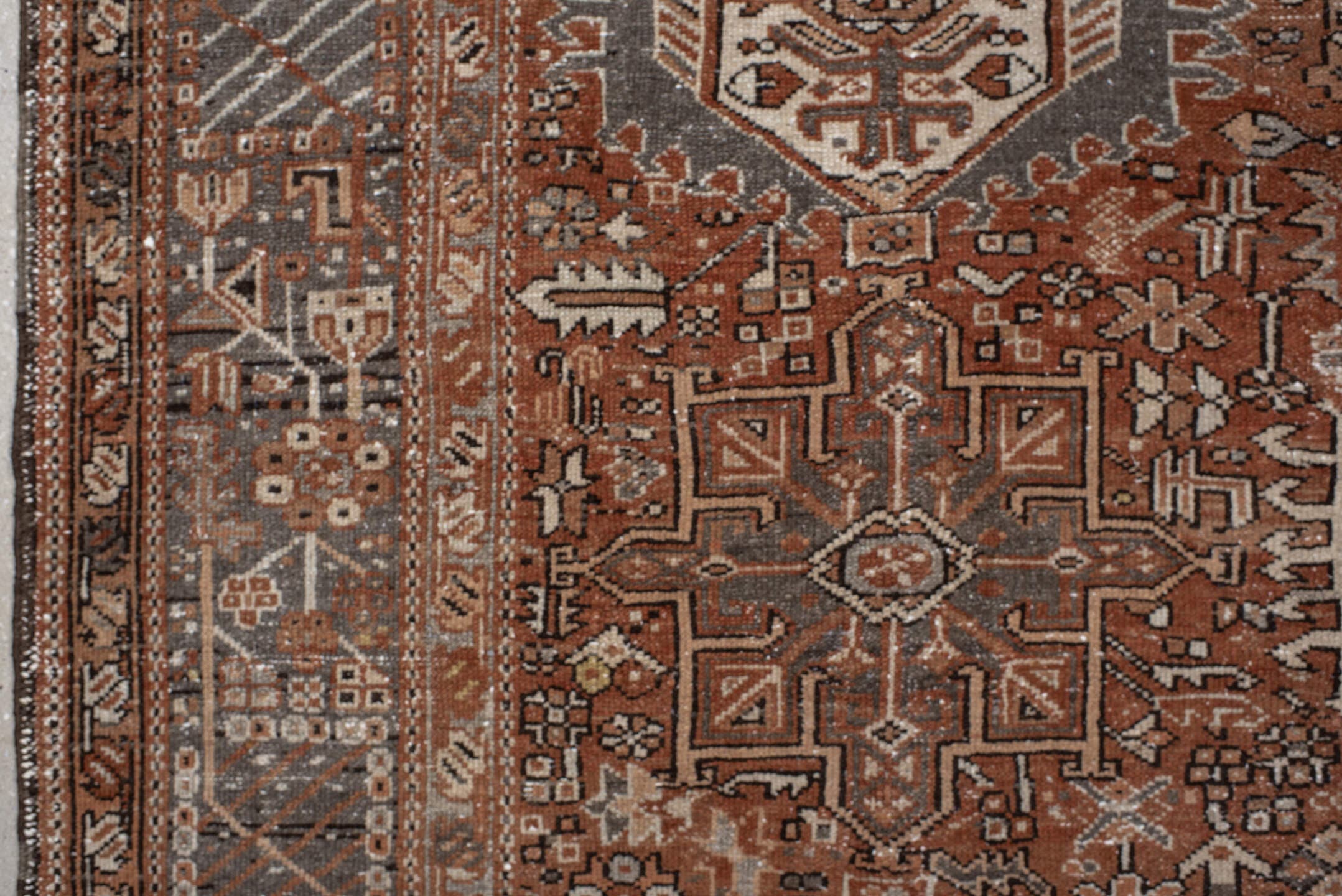 7' x 10' one-of-a-kind handmade vintage Karaje large size rug. Color palette: rust, brown, ivory, slate, taupe, camel