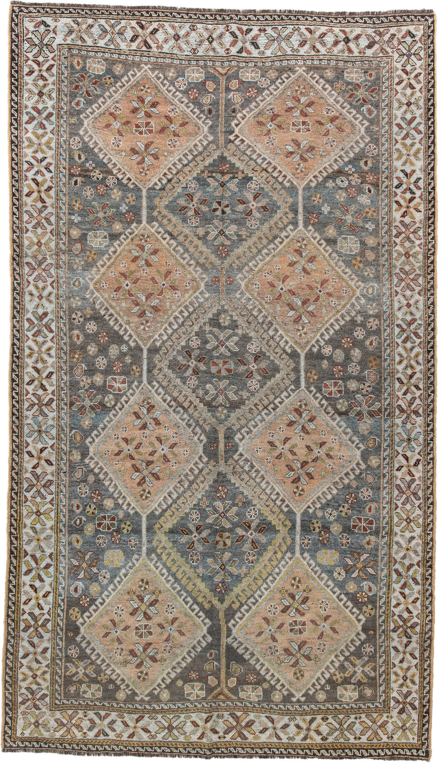 4' x 8' one-of-a-kind handmade vintage Shiraz rug. Color palette: slate, ivory, camel, taupe, rust, charcoal, sage, gold