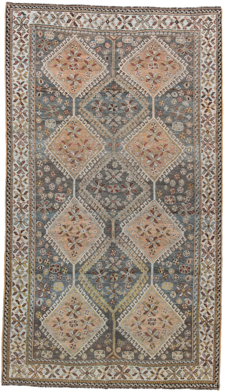 4' x 8' one-of-a-kind handmade vintage Shiraz rug. Color palette: slate, ivory, camel, taupe, rust, charcoal, sage, gold