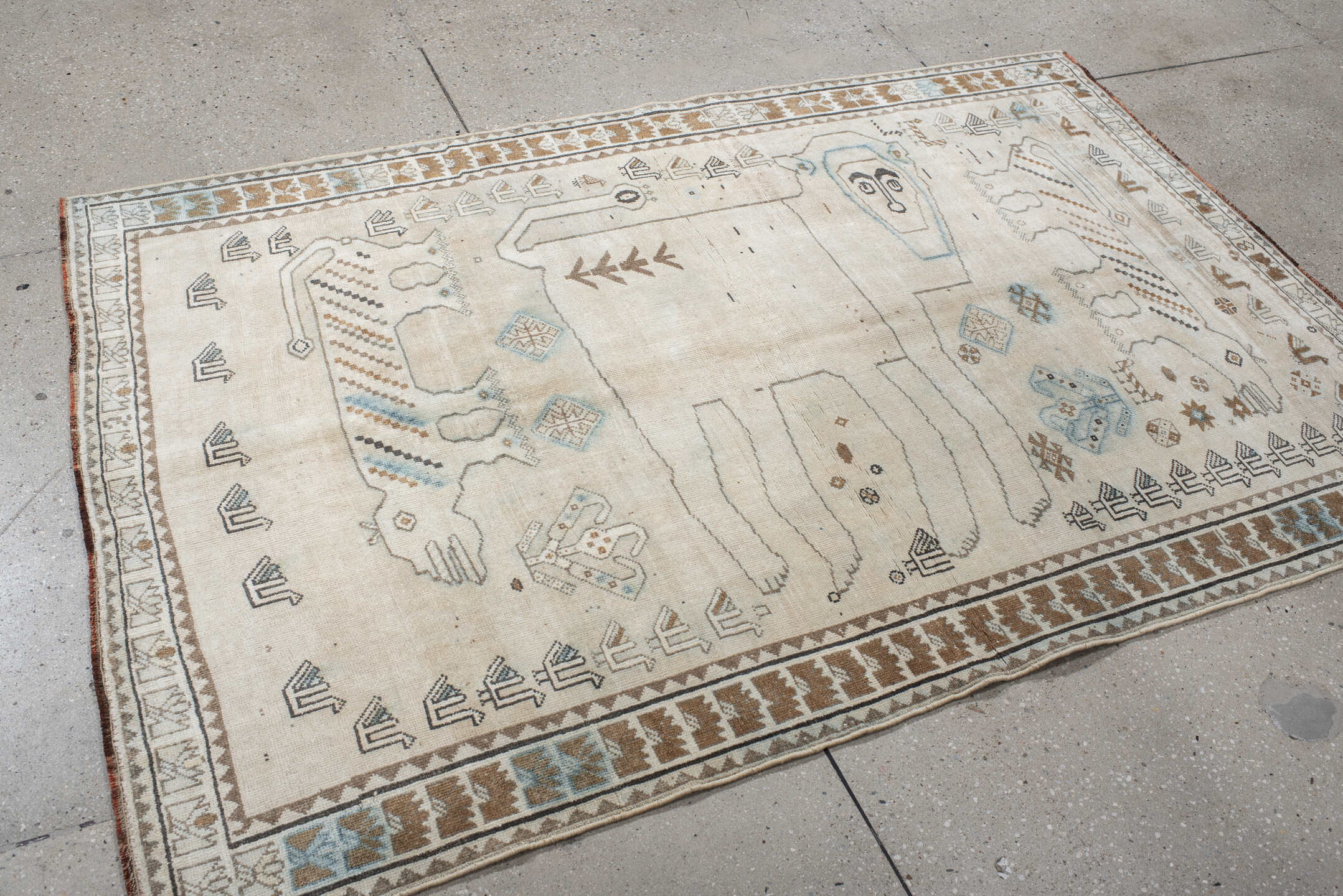 4' x 6' one-of-a-kind handmade vintage Gabbe small size rug. Color palette: ivory, camel, sky blue, brown, taupe, charcoal