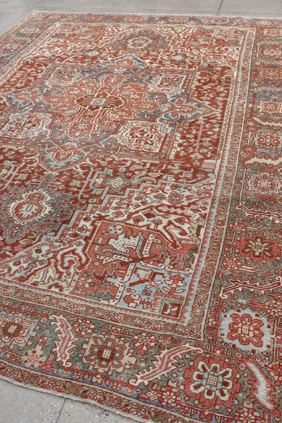 8' x 11' one-of-a-kind handmade antique Heriz large size rug. Color palette: rust, ivory, powder_blue, terra_cotta, camel