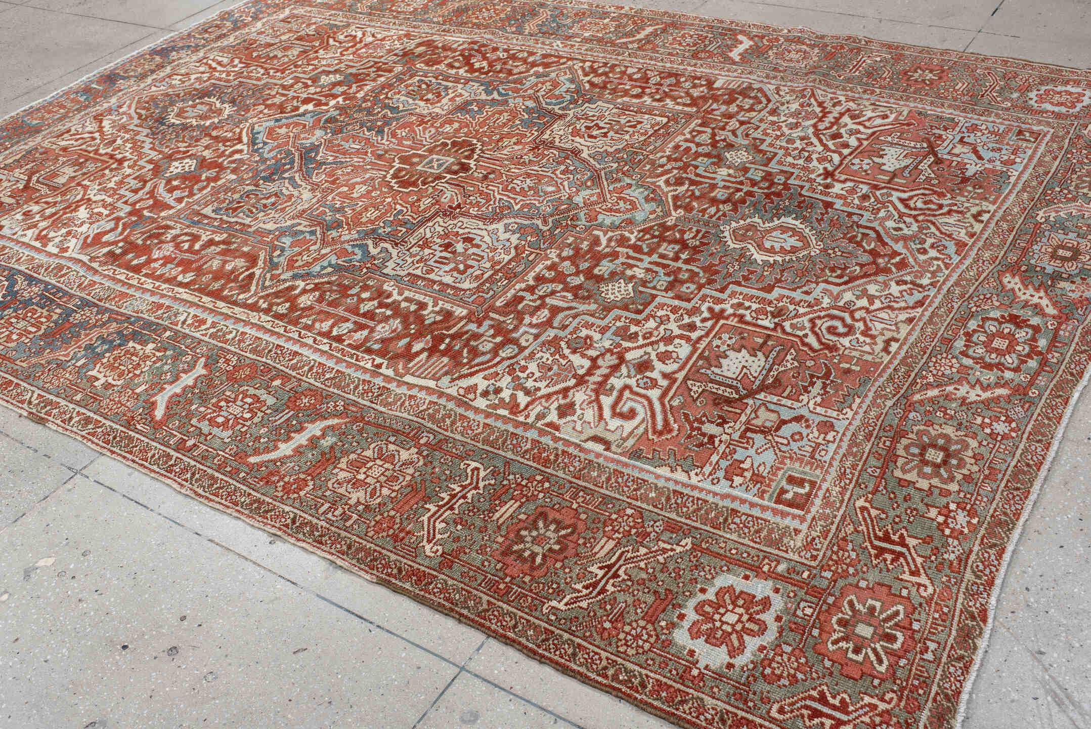 8' x 11' one-of-a-kind handmade antique Heriz large size rug. Color palette: rust, ivory, powder_blue, terra_cotta, camel