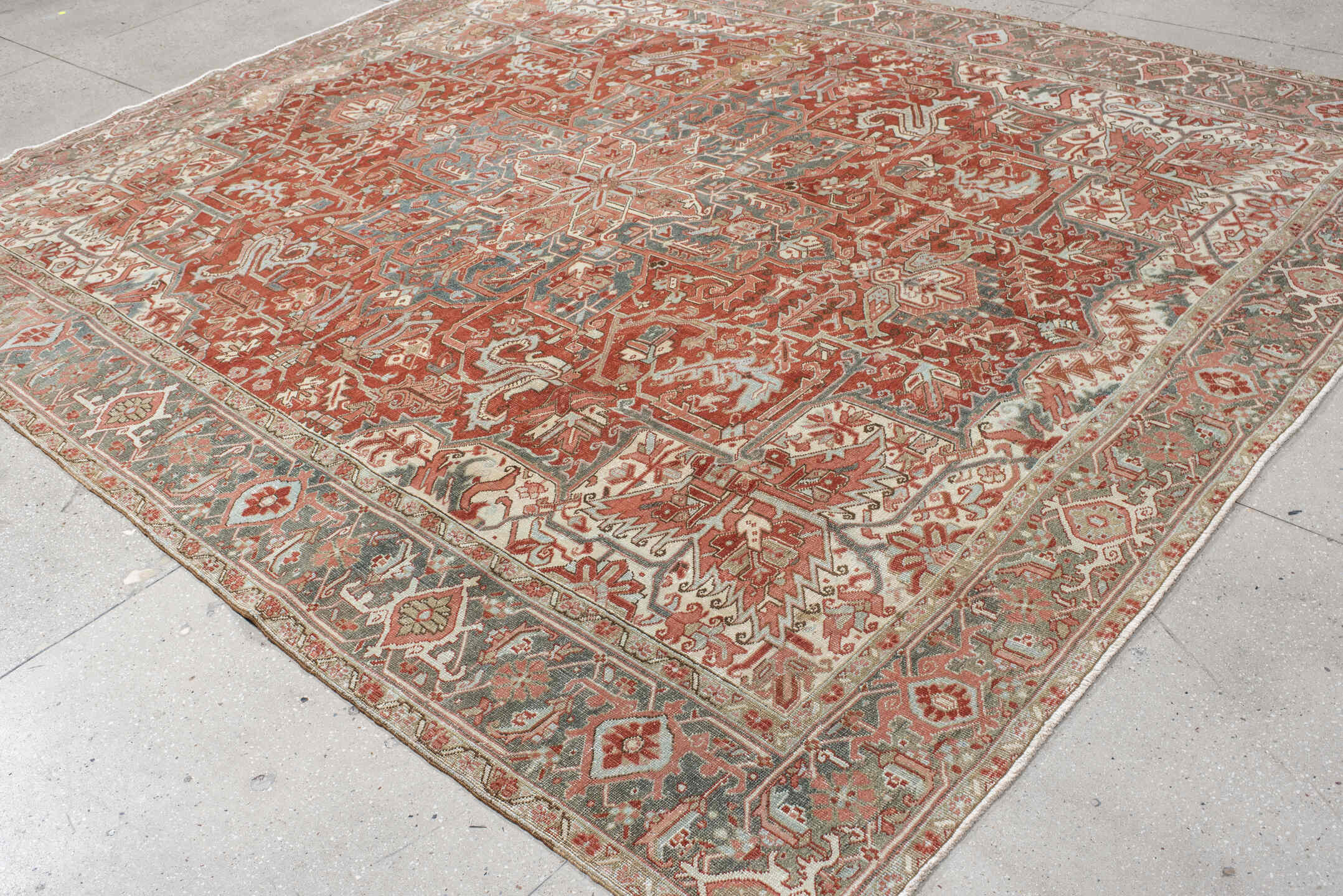 9' x 11' one-of-a-kind handmade vintage Heriz large size rug. Color palette: rust, ivory, slate, rose, taupe, sage