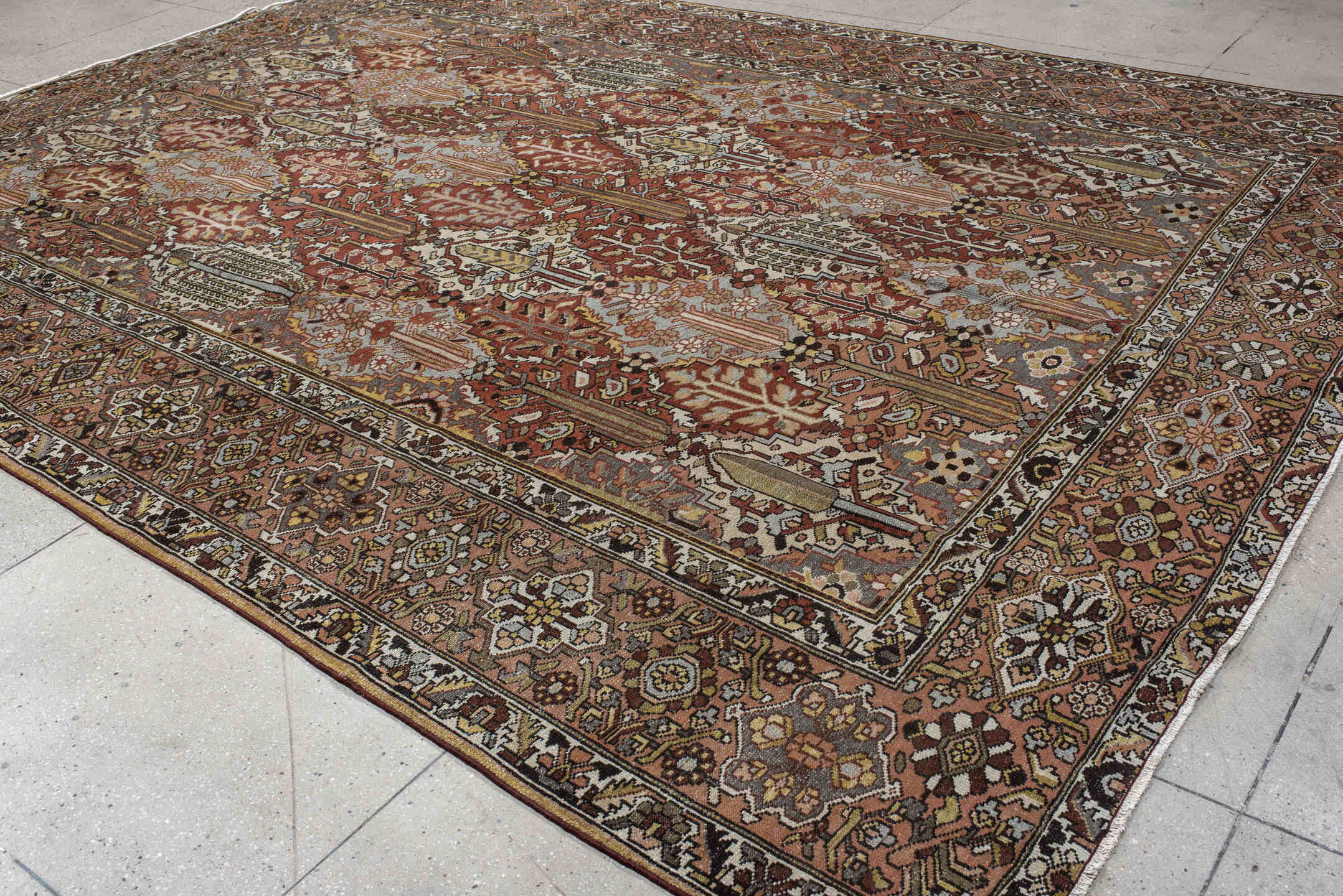 10' x 14' one-of-a-kind handmade vintage Baktiary large size rug. Color palette: rust, slate, ivory, rose, taupe, gold