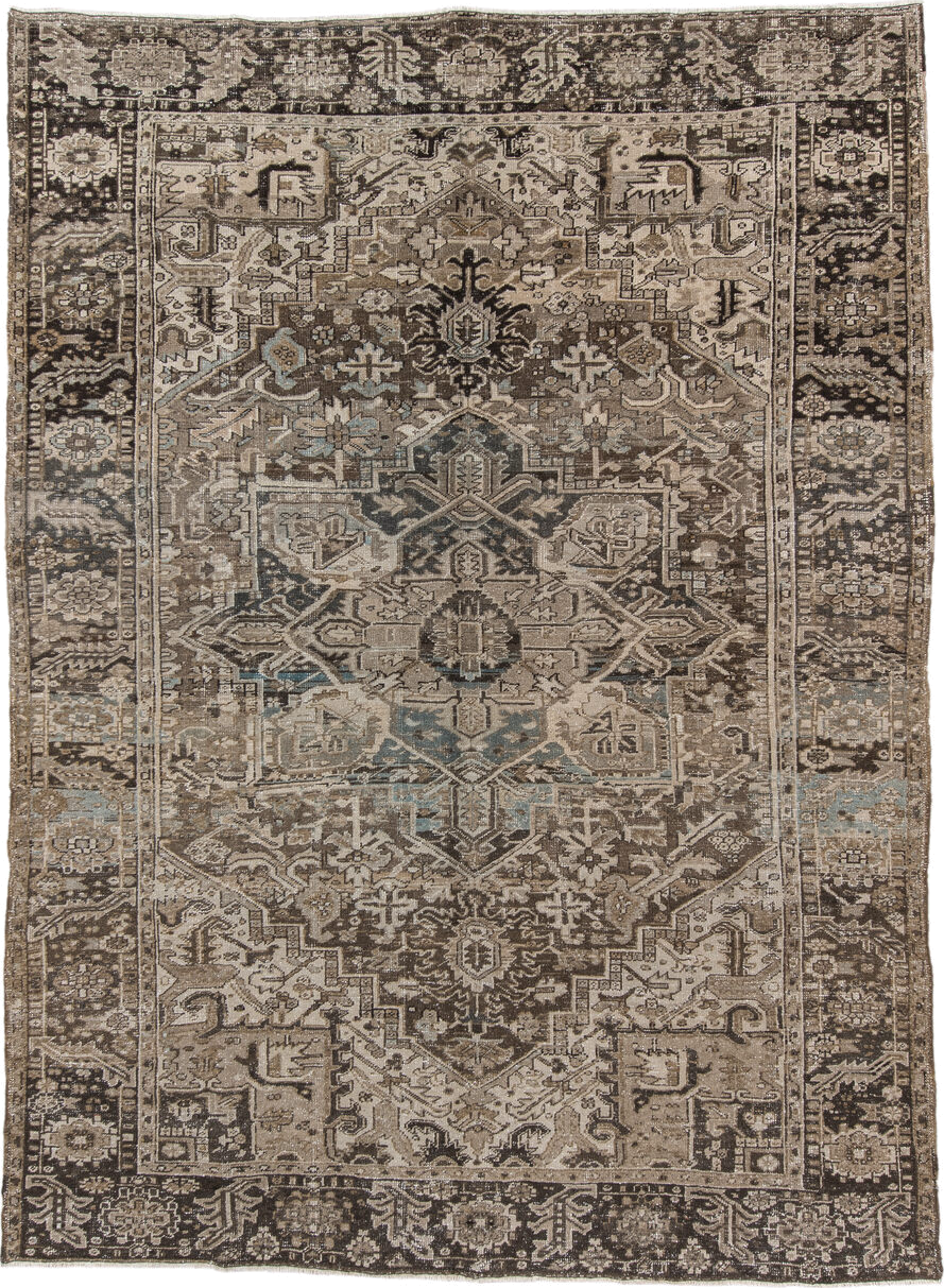 7' x 10' one-of-a-kind handmade antique Heriz large size rug. Color palette: taupe, brown, ivory, charcoal, faded blue