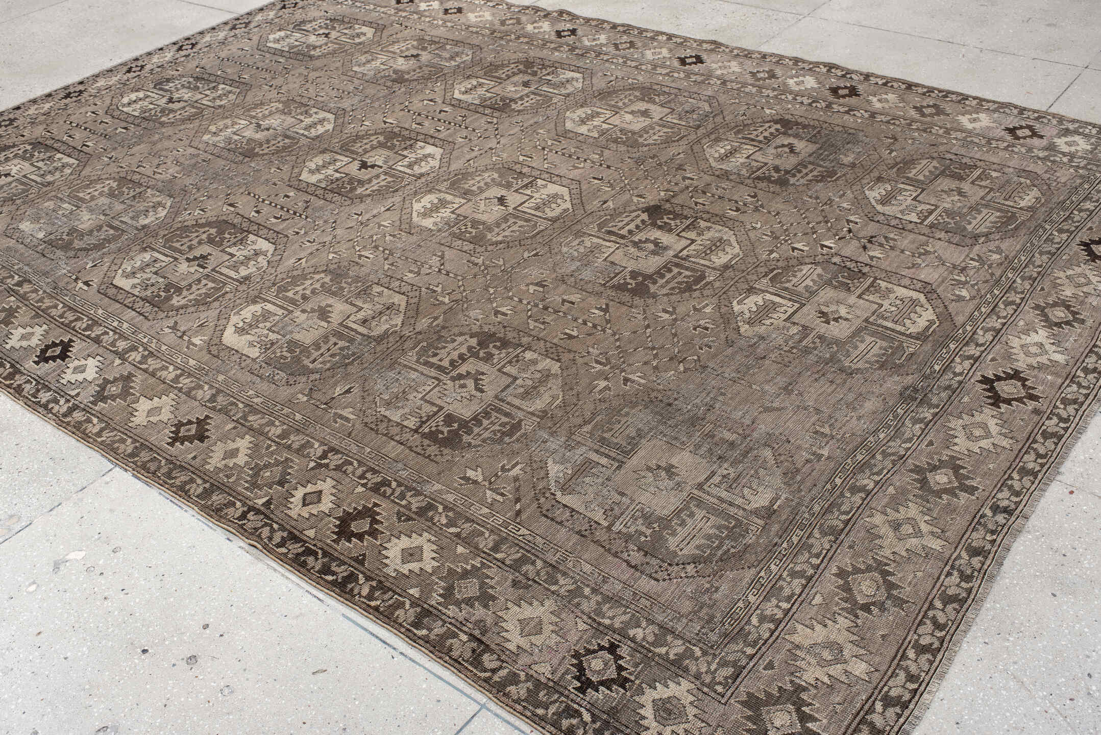 8' x 11' one-of-a-kind handmade vintage Afghan large size rug. Color palette: taupe, ivory, charcoal, brown, beige, gray