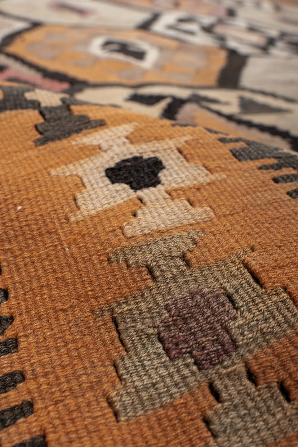 6' x 12' one-of-a-kind handmade antique Kilim large size rug. Color palette: camel, brown, taupe, ochre, ivory, plum