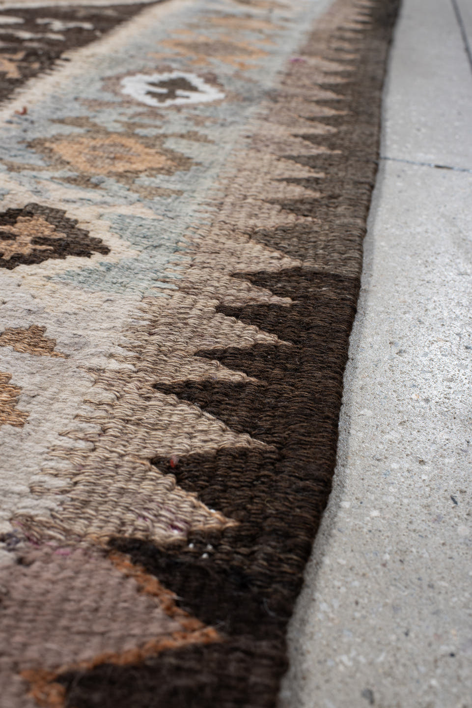 4' x 14' one-of-a-kind handmade antique Kilim runner rug. Color palette: brown, sky blue, taupe, ivory, camel, charcoal
