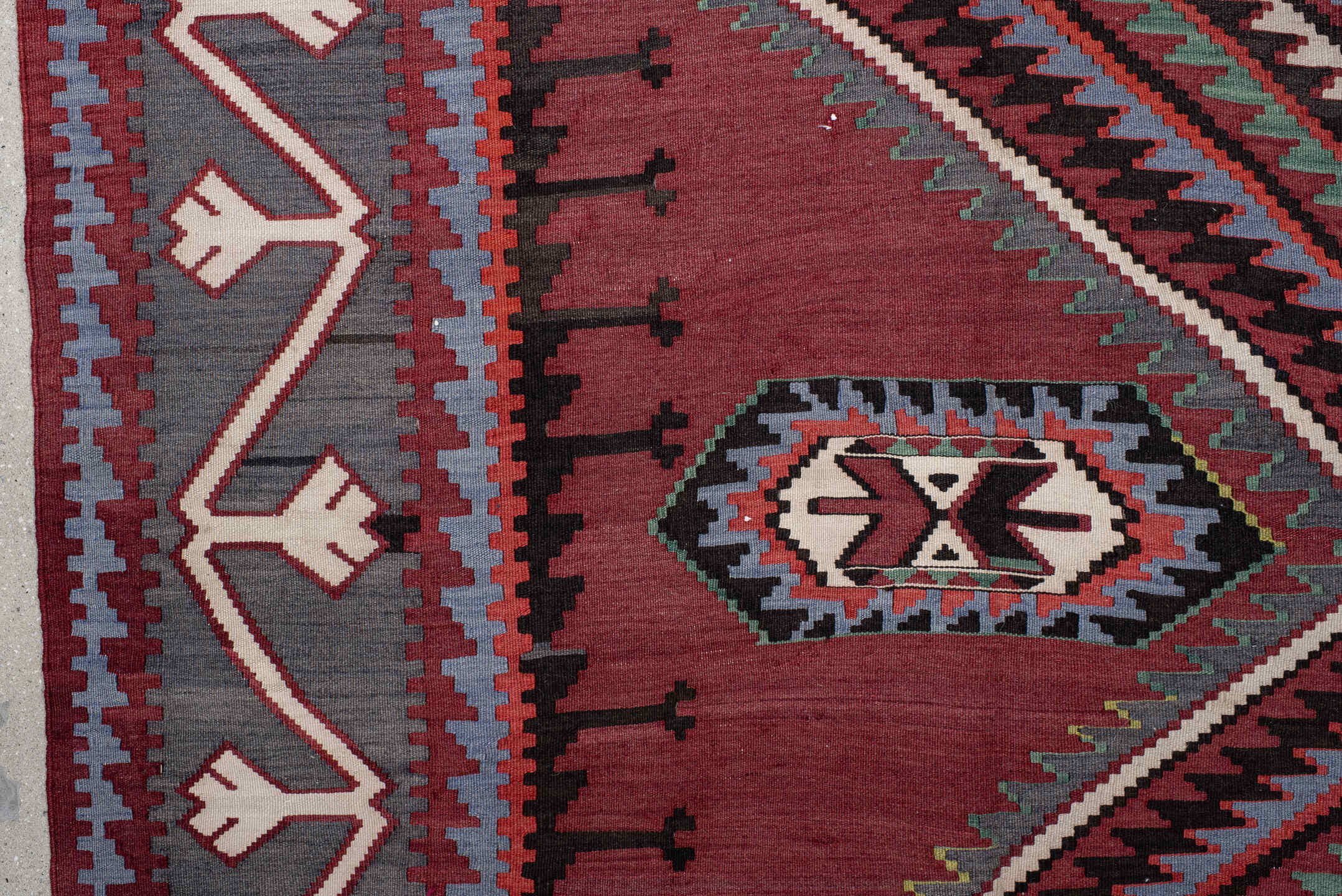 6' x 11' one-of-a-kind handmade vintage Kilim large size rug. Color palette: rust, burgundy, slate, ivory, black, teal