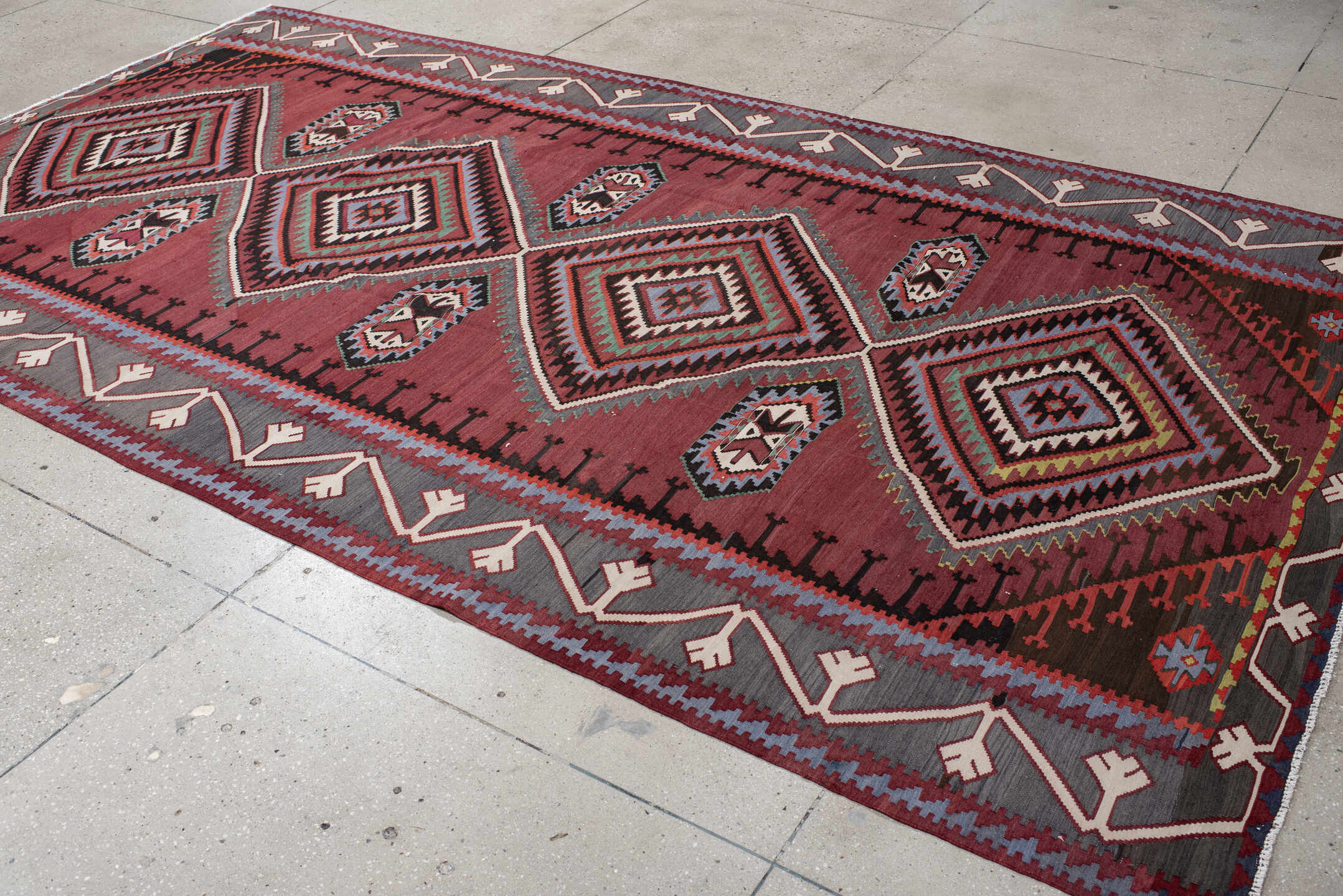6' x 11' one-of-a-kind handmade vintage Kilim large size rug. Color palette: rust, burgundy, slate, ivory, black, teal