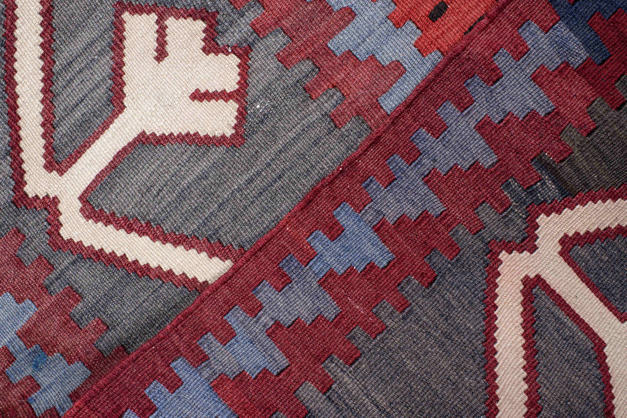 6' x 11' one-of-a-kind handmade vintage Kilim large size rug. Color palette: rust, burgundy, slate, ivory, black, teal