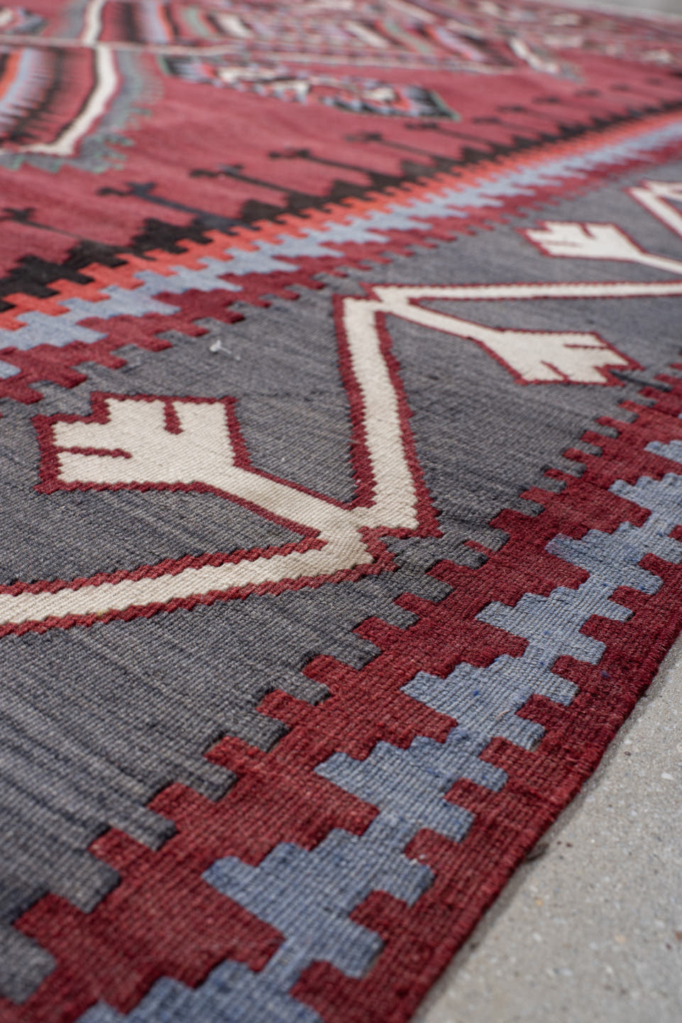 6' x 11' one-of-a-kind handmade vintage Kilim large size rug. Color palette: rust, burgundy, slate, ivory, black, teal