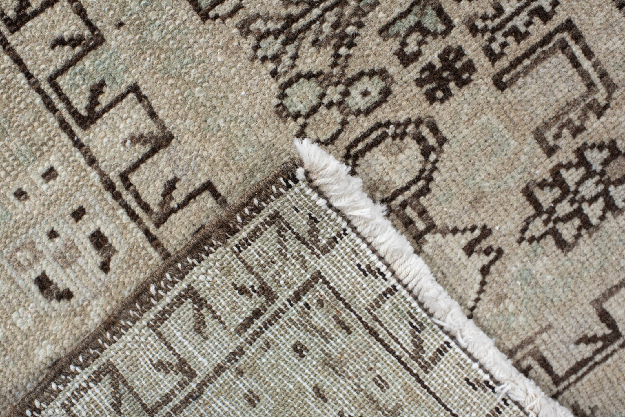 4' x 10' one-of-a-kind handmade vintage Karaje runner rug. Color palette: ivory, taupe, brown, camel, sage, charcoal, beige