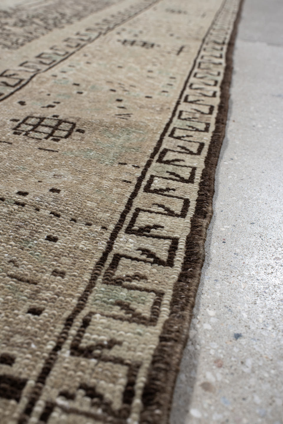 4' x 10' one-of-a-kind handmade vintage Karaje runner rug. Color palette: ivory, taupe, brown, camel, sage, charcoal, beige