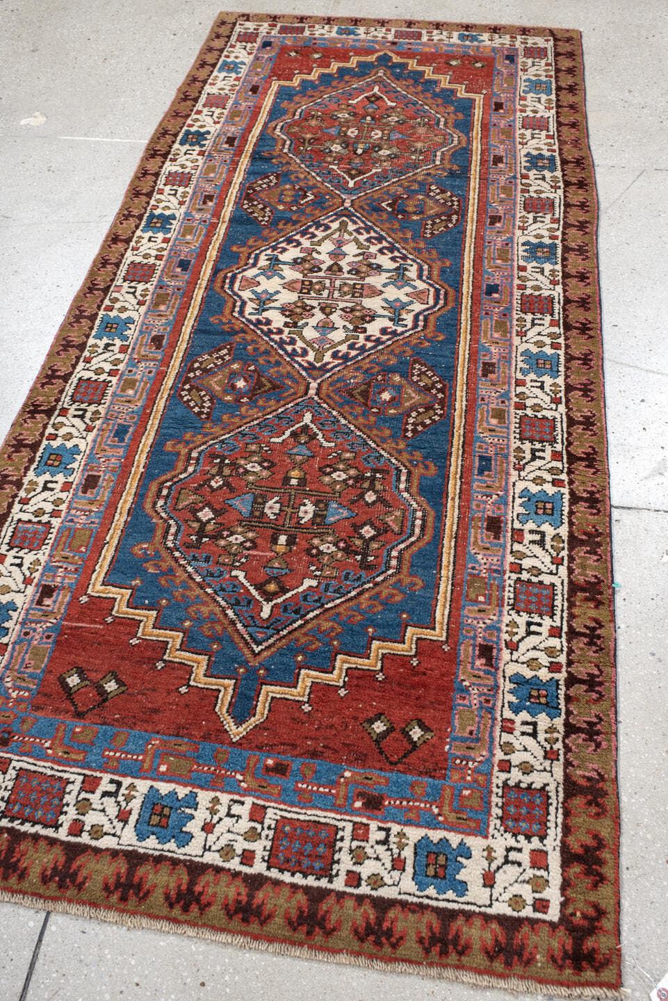 3' x 7' one-of-a-kind handmade vintage Sarab runner rug. Color palette: red, blue, ivory, rose, brown, burgundy, camel, pink