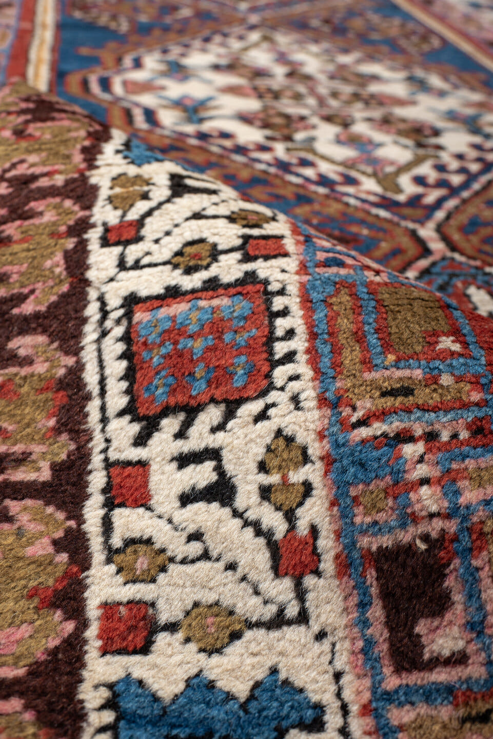 3' x 7' one-of-a-kind handmade vintage Sarab runner rug. Color palette: red, blue, ivory, rose, brown, burgundy, camel, pink