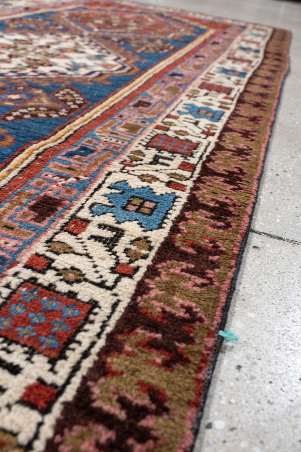 3' x 7' one-of-a-kind handmade vintage Sarab runner rug. Color palette: red, blue, ivory, rose, brown, burgundy, camel, pink