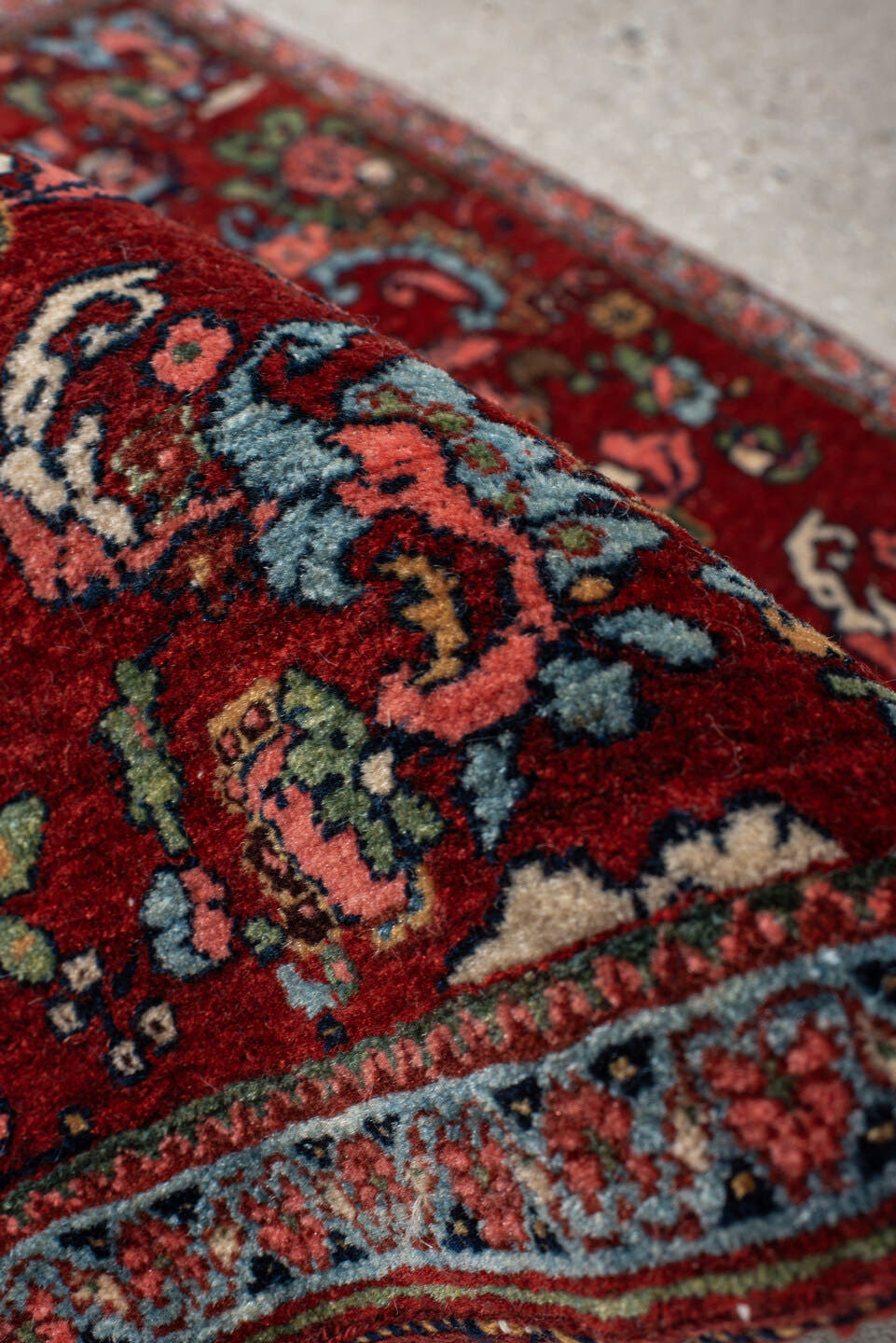 1' x 2' one-of-a-kind handmade vintage Bidjar small size rug. Color palette: rust, turquoise, navy, ivory, rose, sage, coral