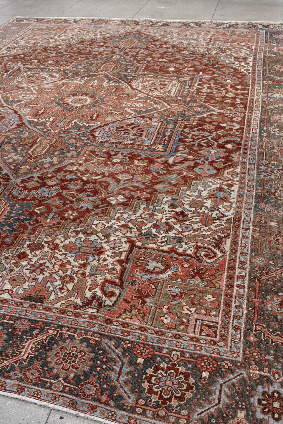 11' x 14' one-of-a-kind handmade vintage Heriz oversize rug. Color palette: brown, pink, gray, black, light gray, orange