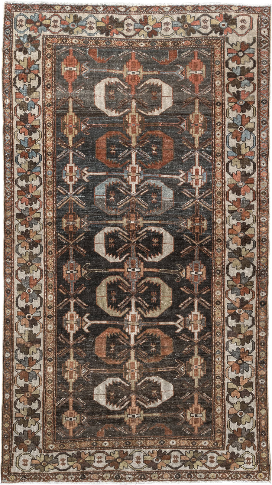 4' x 7' one-of-a-kind handmade antique Shirvan rug. Color palette: charcoal, ivory, rust, taupe, slate, camel, terracotta