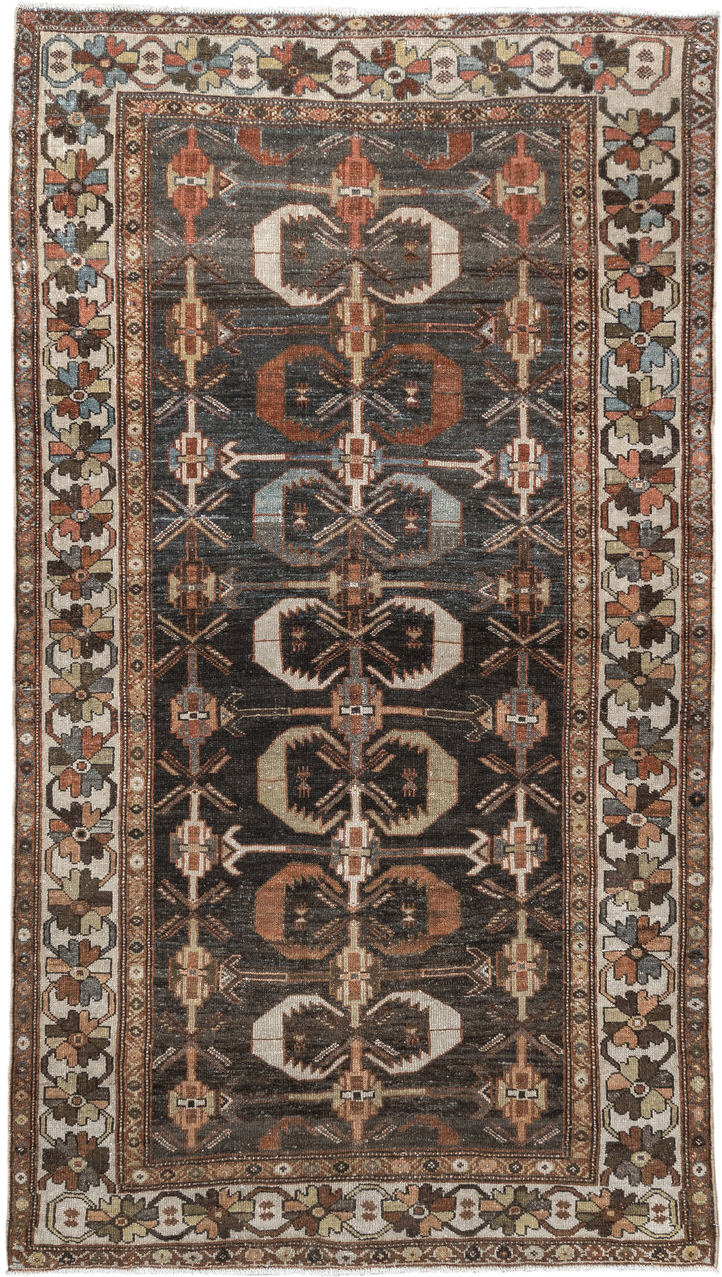 4' x 7' one-of-a-kind handmade antique Shirvan rug. Color palette: charcoal, ivory, rust, taupe, slate, camel, terracotta