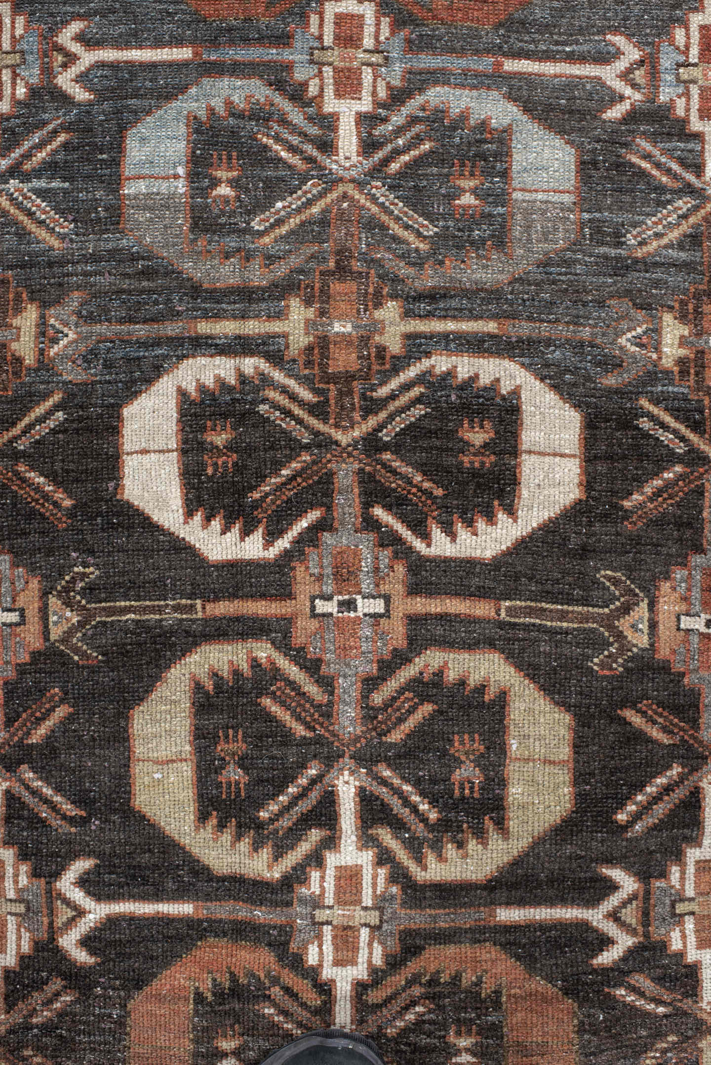 4' x 7' one-of-a-kind handmade antique Shirvan rug. Color palette: charcoal, ivory, rust, taupe, slate, camel, terracotta