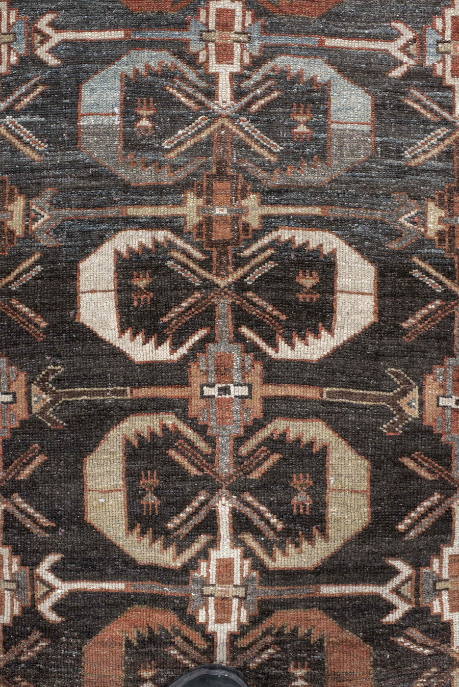 4' x 7' one-of-a-kind handmade antique Shirvan rug. Color palette: charcoal, ivory, rust, taupe, slate, camel, terracotta